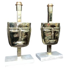 Pair of Italian design Masks Table Lamps cast Brass Travertine Marble Base