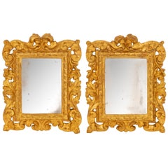 Pair of Italian Early 18th Century Baroque Period Giltwood Mirrors