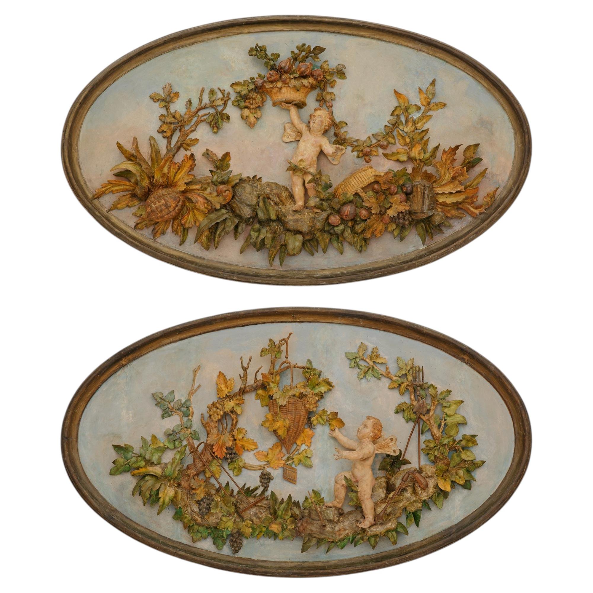 pair of Italian early 18th century Louis XV st. patinated Wood plaques