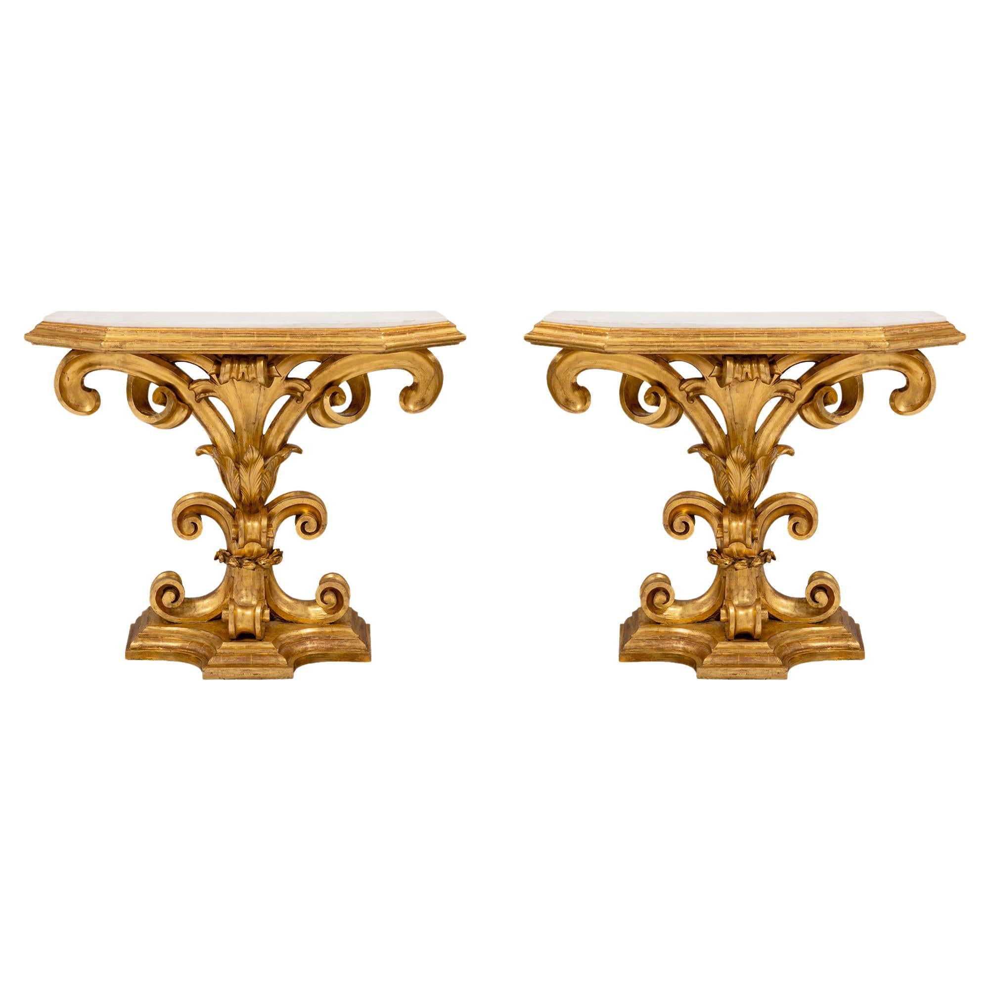 Pair of Italian Early 19th Century Baroque Giltwood Consoles