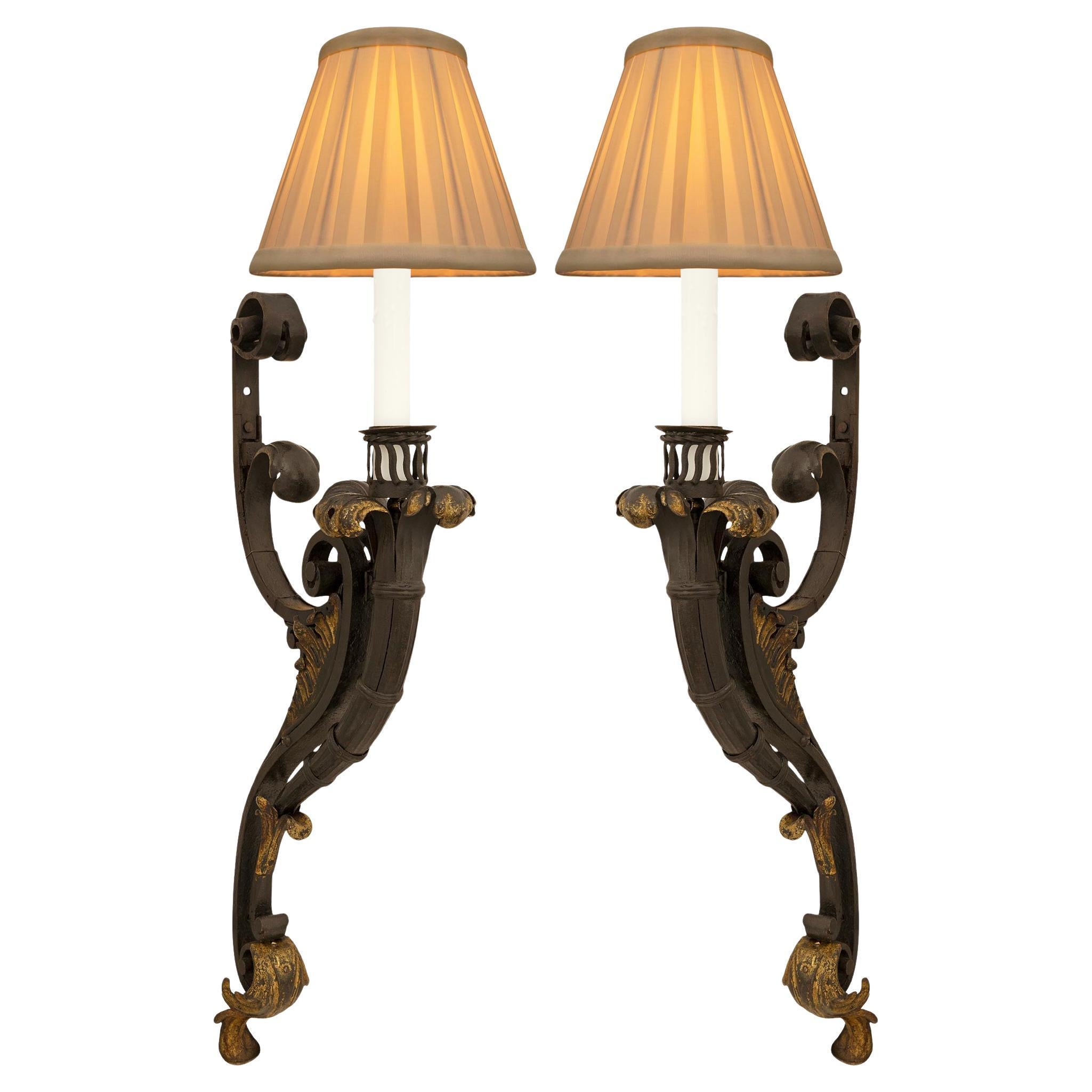 coppia di appliques italiane del primo Ottocento in ferro e dorate