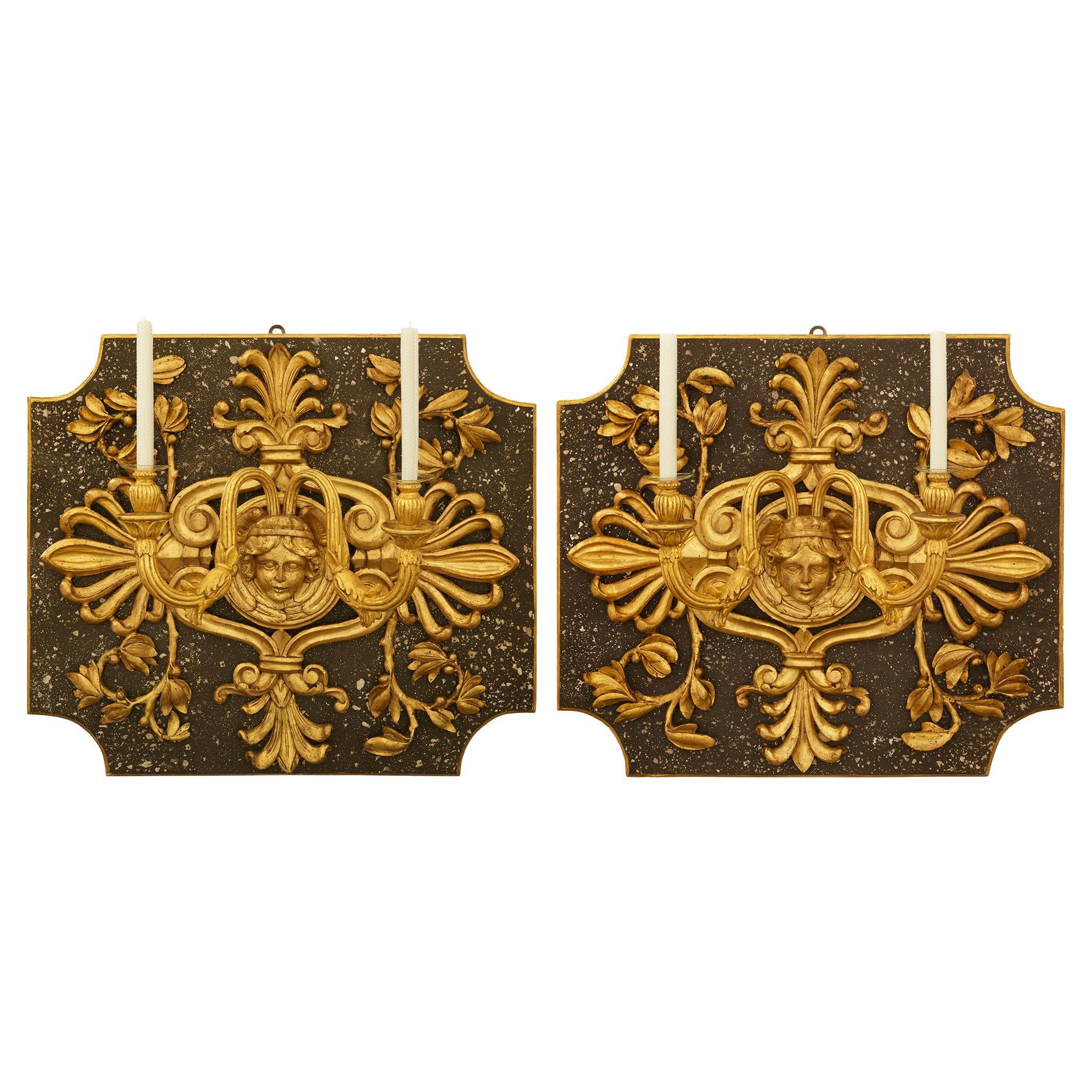 pair of Italian early 19th century Louis XIV st. patinated and Giltwood sconces For Sale
