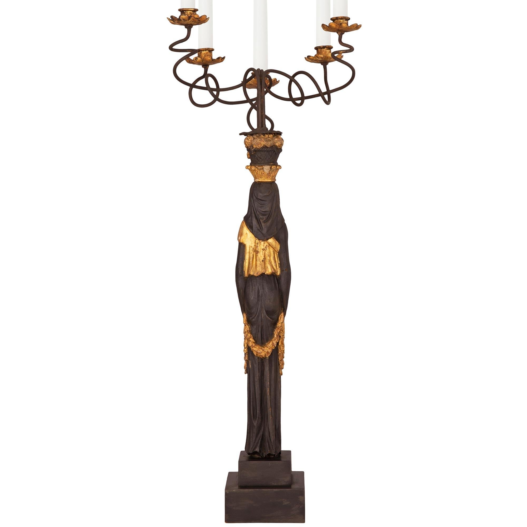 Pair of Italian Ebonized and Giltwood Maiden Five Arm Candelabras In Good Condition For Sale In West Palm Beach, FL