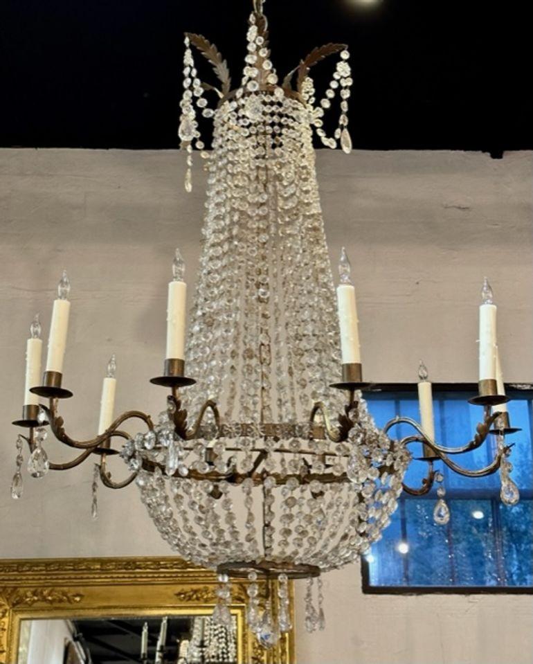 Pair of 19th century Italian Empire tole and crystal basket chandeliers. Circa 1890. These chandeliers have been professionally rewired, and comes with matching chain and canopy. It is ready to hang!