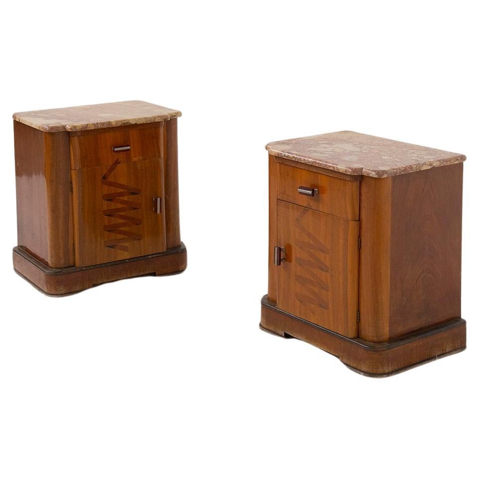 Pair of Italian Futurist bedside tables in marble and wood, with iconographic in