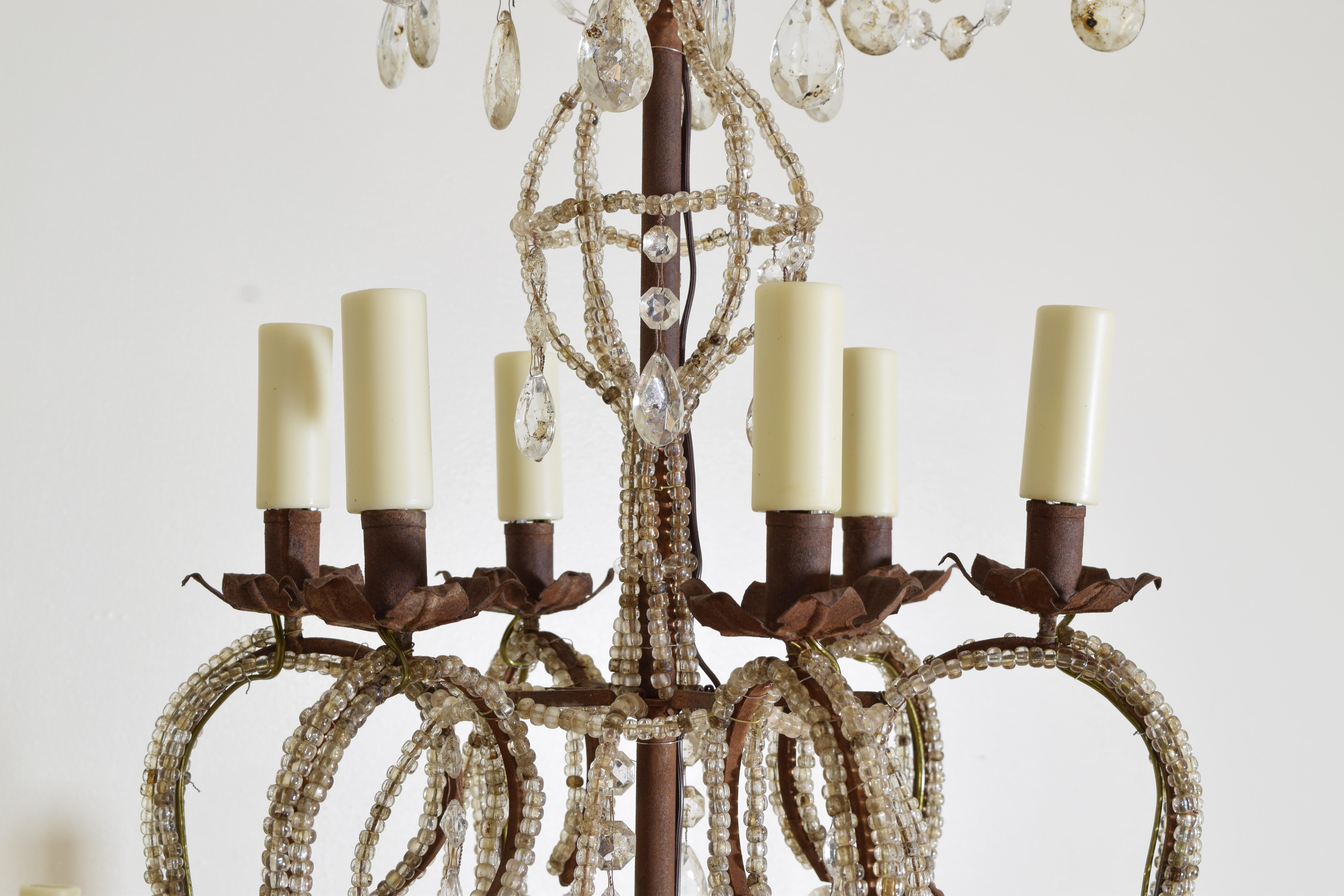 Pair of Italian, Genovese, 2-Tier, 12-Light Glass and Iron Chandeliers In Good Condition For Sale In Atlanta, GA