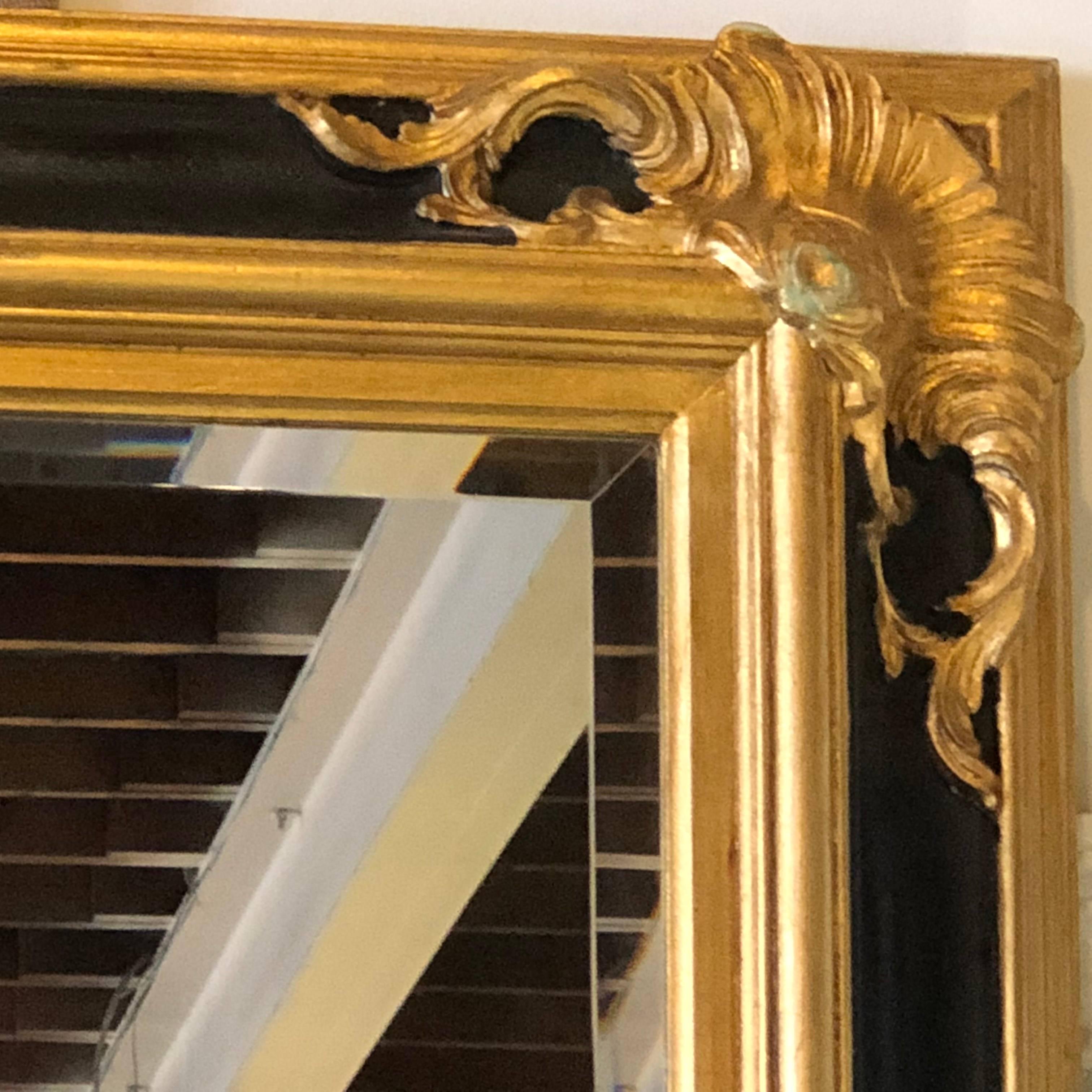 Pair of Italian Gilt and Ebony Beveled Monumental Console or Wall Mirrors In Good Condition In Manhasset, NY