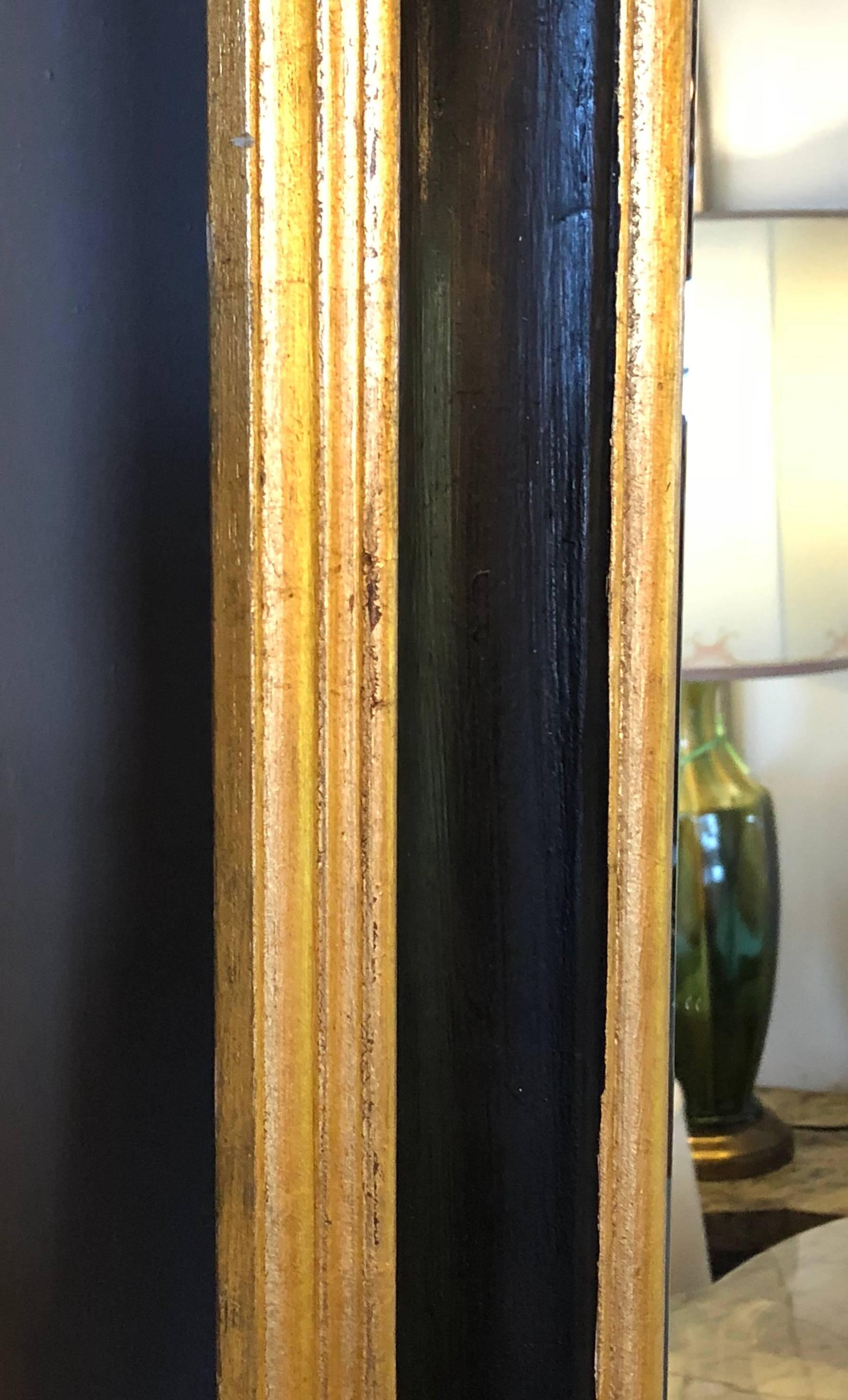 Pair of Italian Gilt and Ebony Beveled Monumental Console or Wall Mirrors 3