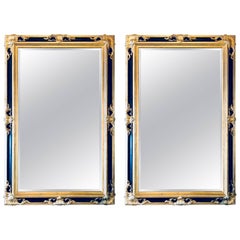 Pair of Italian Gilt and Ebony Beveled Monumental Console or Wall Mirrors
