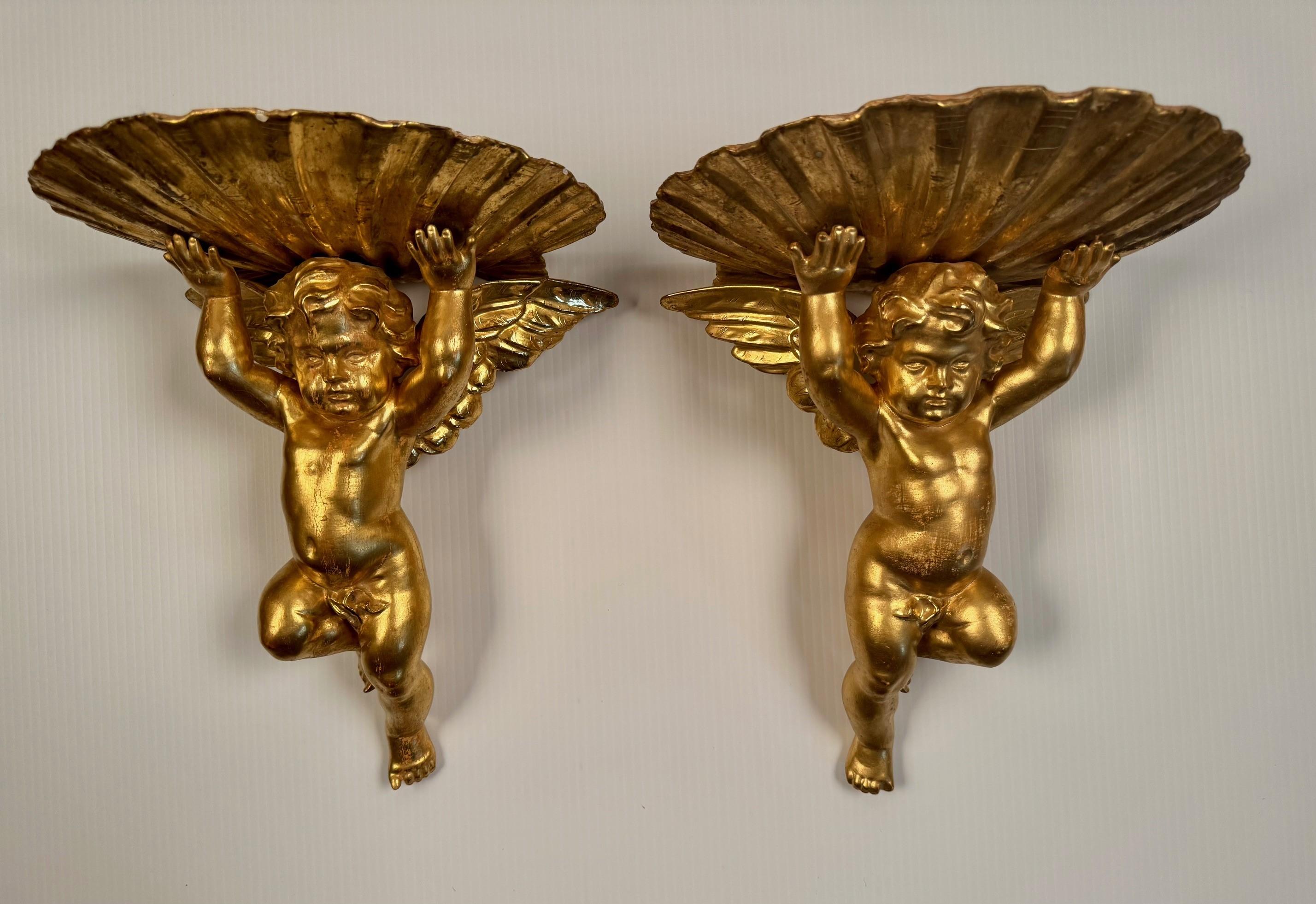 Rococo Pair of Italian Gilt Brackets Modelled as Cherubs For Sale