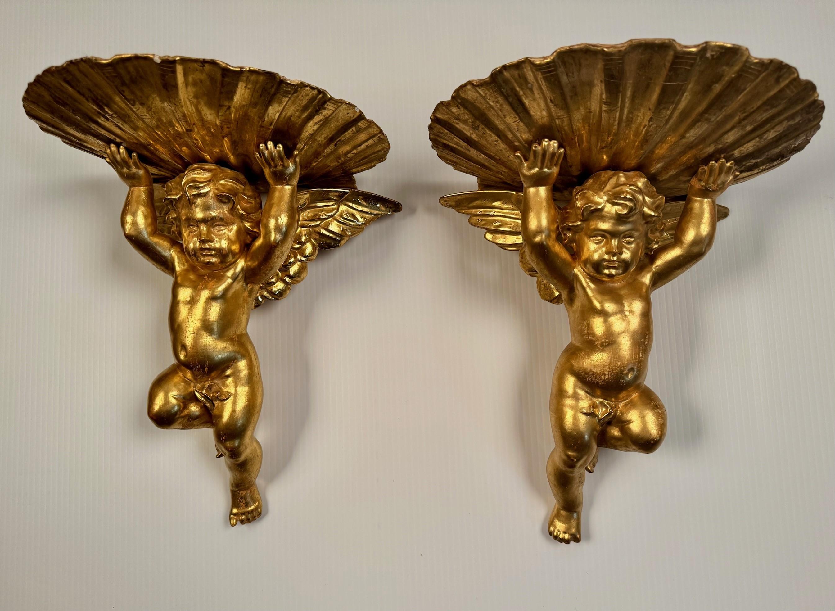 Hand-Carved Pair of Italian Gilt Brackets Modelled as Cherubs For Sale