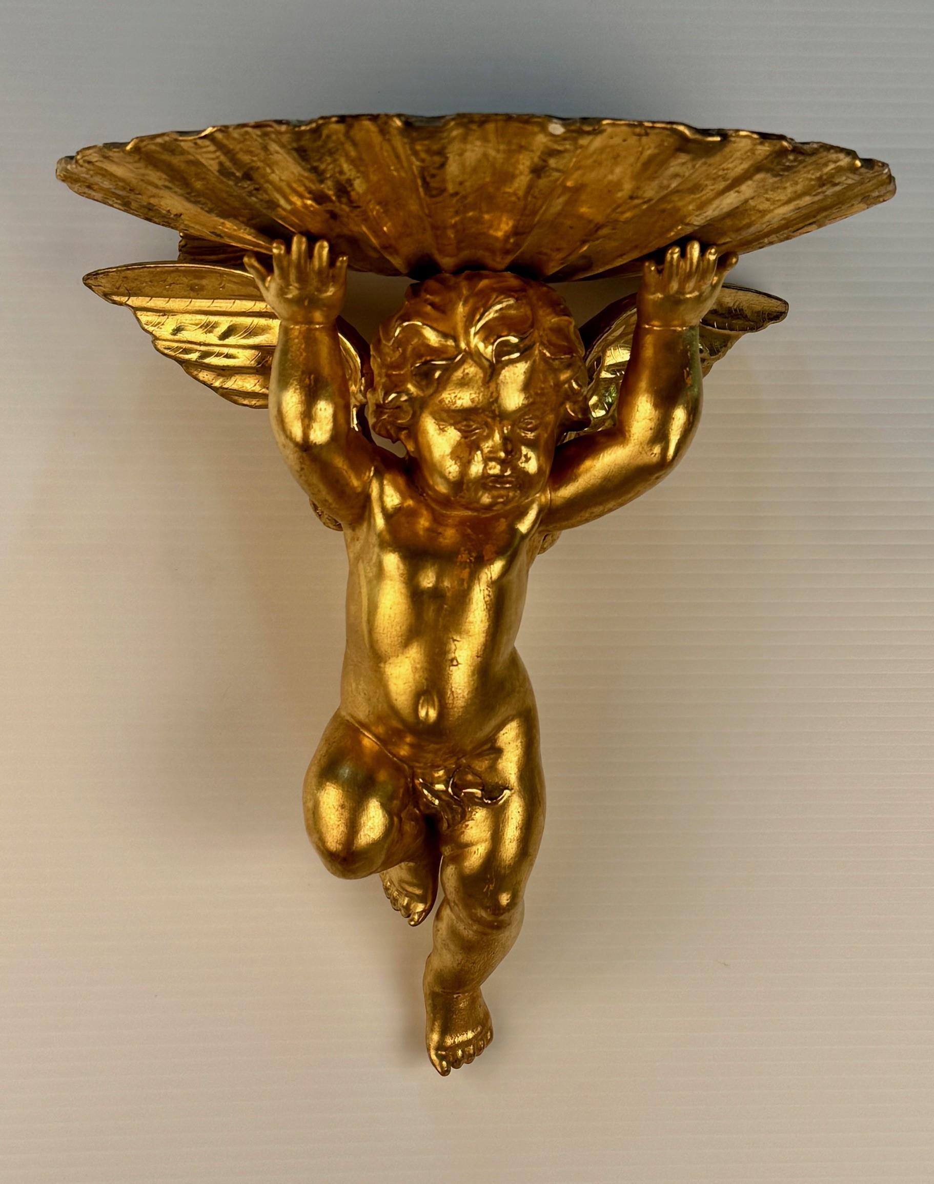 Giltwood Pair of Italian Gilt Brackets Modelled as Cherubs For Sale