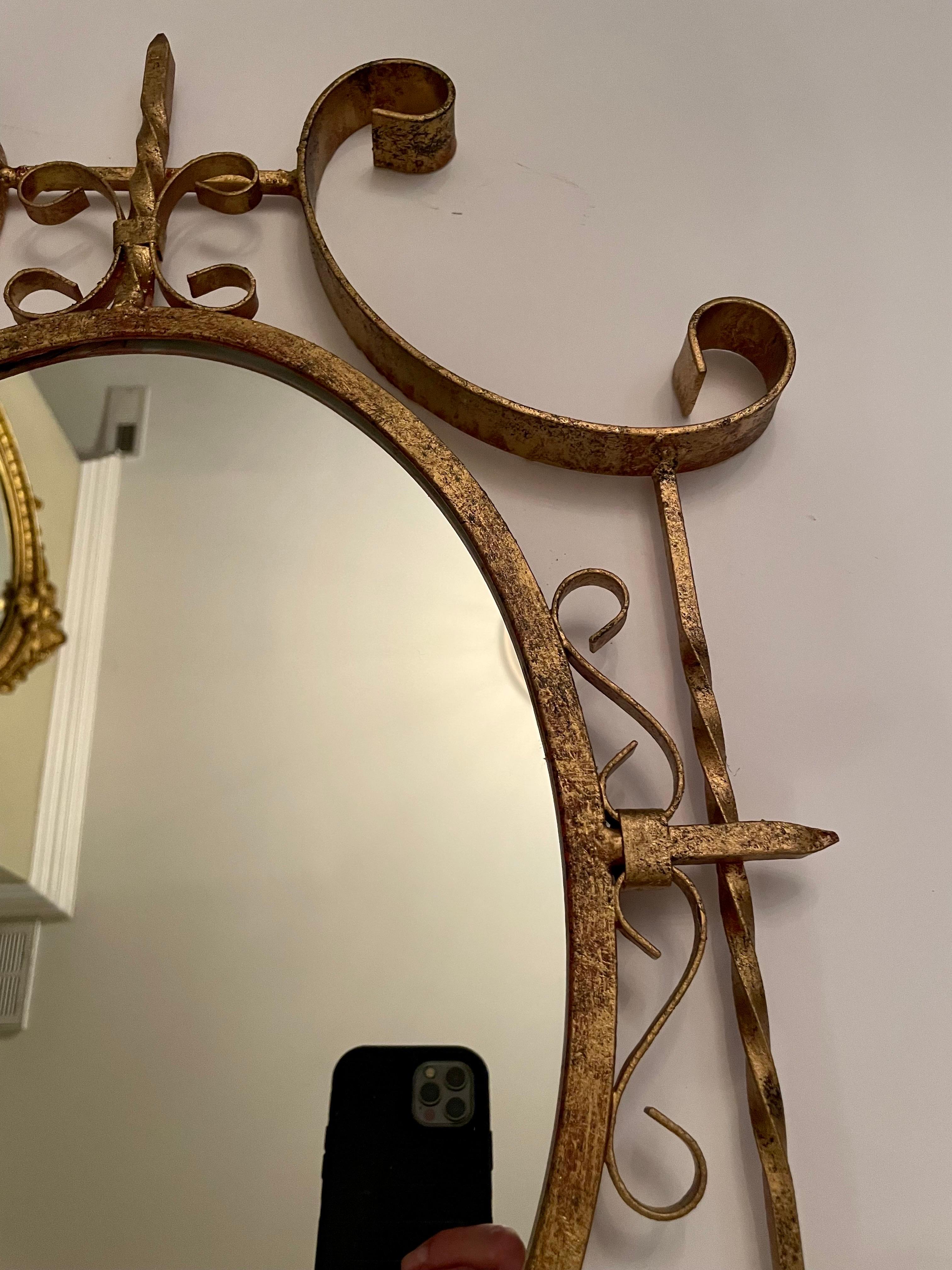 Hollywood Regency Pair of Italian Gilt Iron Scrolled Mirrors
