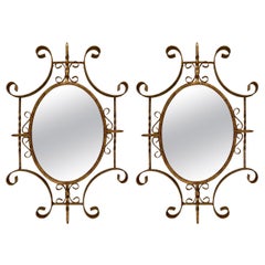 Pair of Italian Gilt Iron Scrolled Mirrors