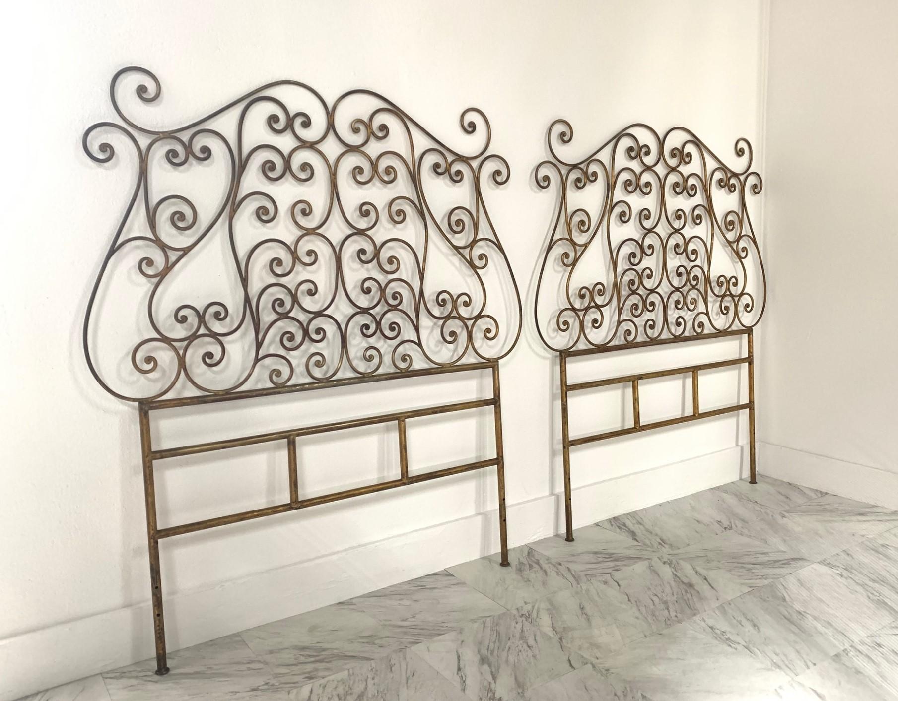 Pair of Italian gilt metal twin-size headboards. Stunning pair of decorative gilt metal, twin size headboards with a lovely scrolled pattern.

Measures (overall) 53H x 47W (at it's widest).
Bottom of frame measures approx 39