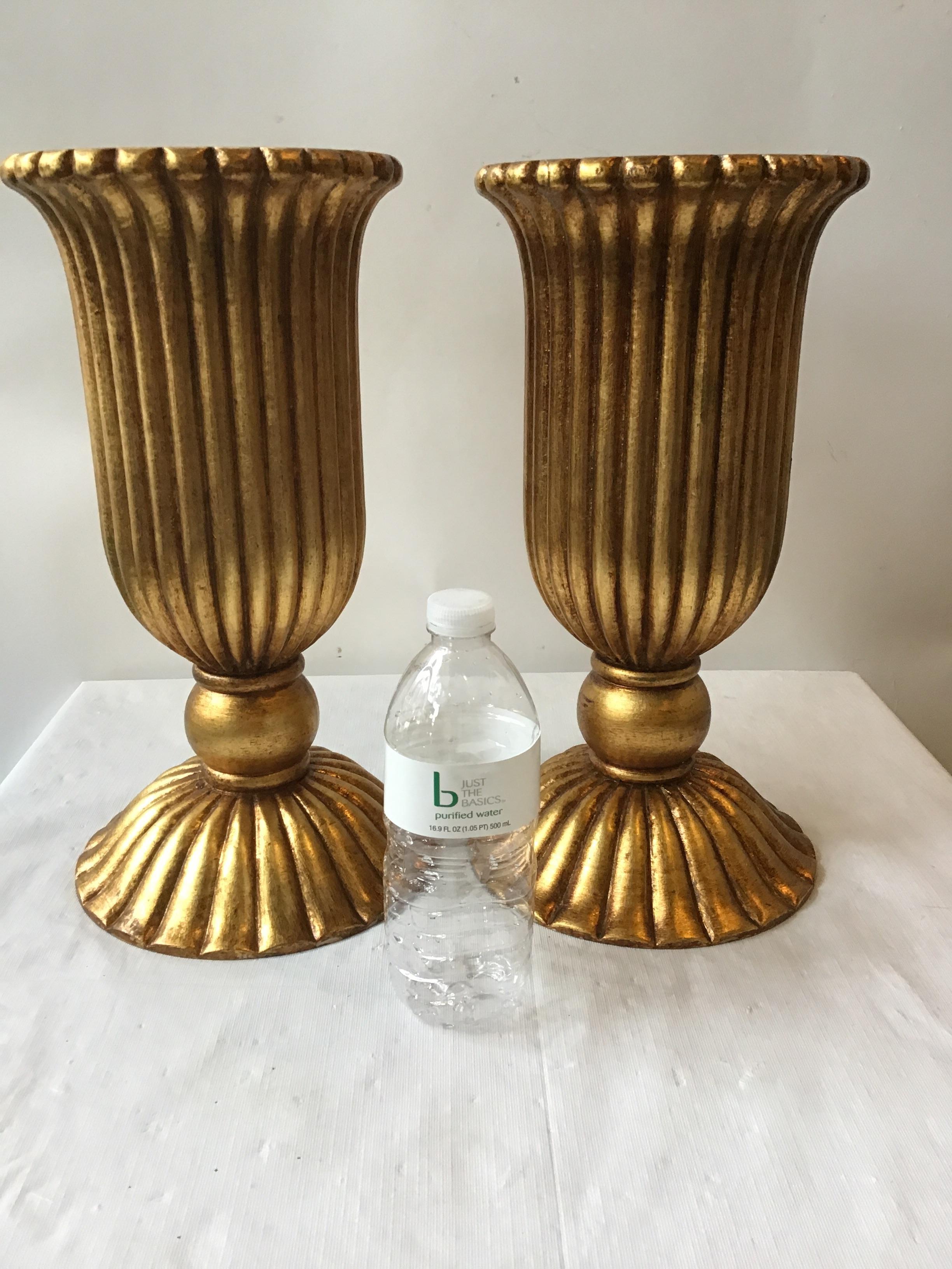 Pair of 1960s giltwood urn shaped lamp bases. Can also be used for table bases. Marked Italy on bottom.