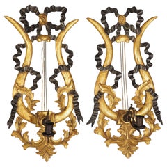 Pair of Italian Giltwood and Ebonized Louis XVI Style Lyre Form Sconces, 1950s