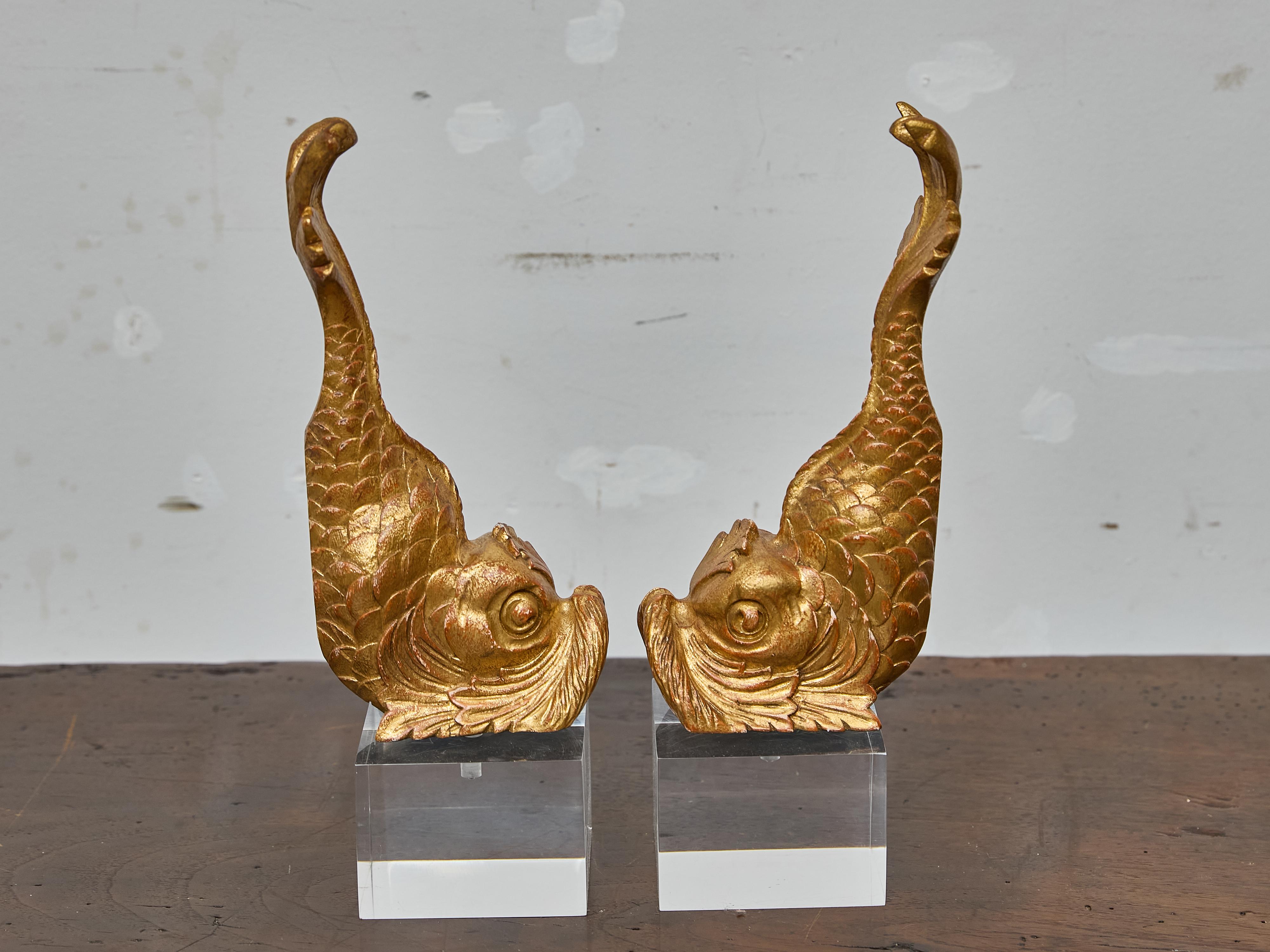 Carved Pair of Italian Giltwood Dolphin Fragments Made into Table Lamps on Lucite Bases For Sale