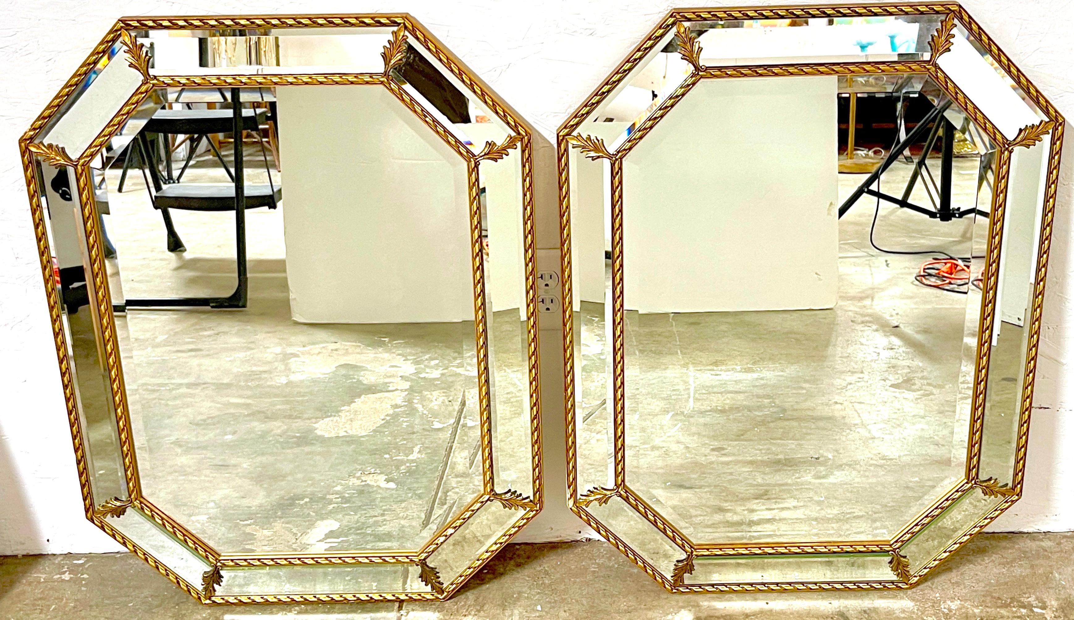Pair of Italian Giltwood Neoclassical Beveled Mirrors 
Italy, circa 1960s

A hard to find Pair of vintage Italian Giltwood Neoclassical Beveled Mirrors originating from Italy in the 1960s. Each mirror, measuring 33 inches in height by 26 inches in