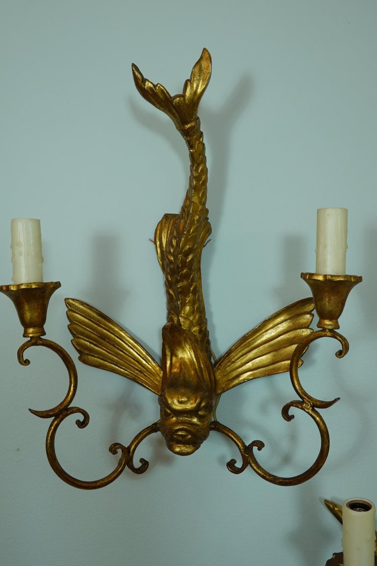 Metal Pair of Italian Giltwood Sconces Featuring Mythical Dolphins For Sale