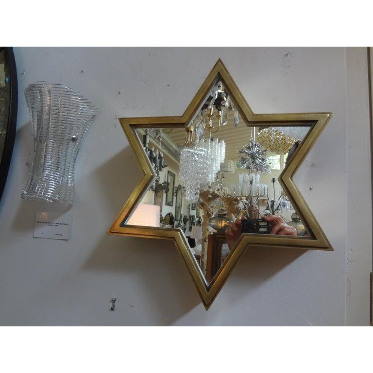 Mid-Century Modern Pair of Italian Brass Star Shaped Mirrors For Sale