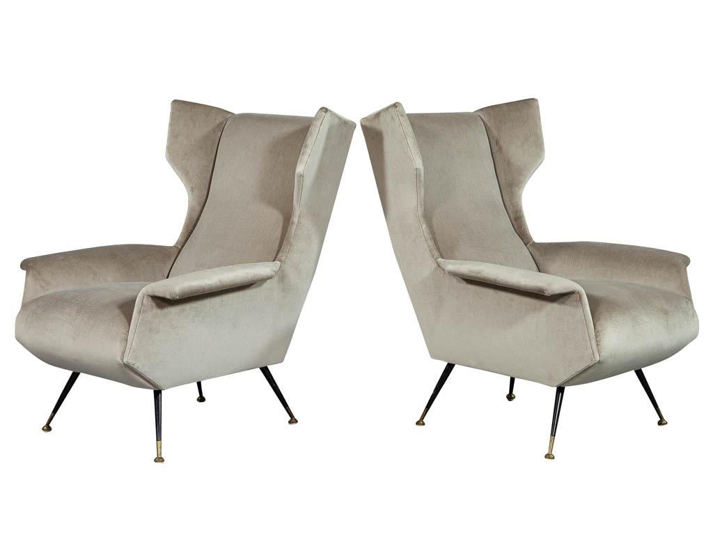 Pair of Italian Gio Ponti style Mid-Century Modern lounge chairs. In excellent condition, recently re-upholstered.