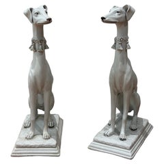 Pair of Italian glazed terracotta Greyhounds statues