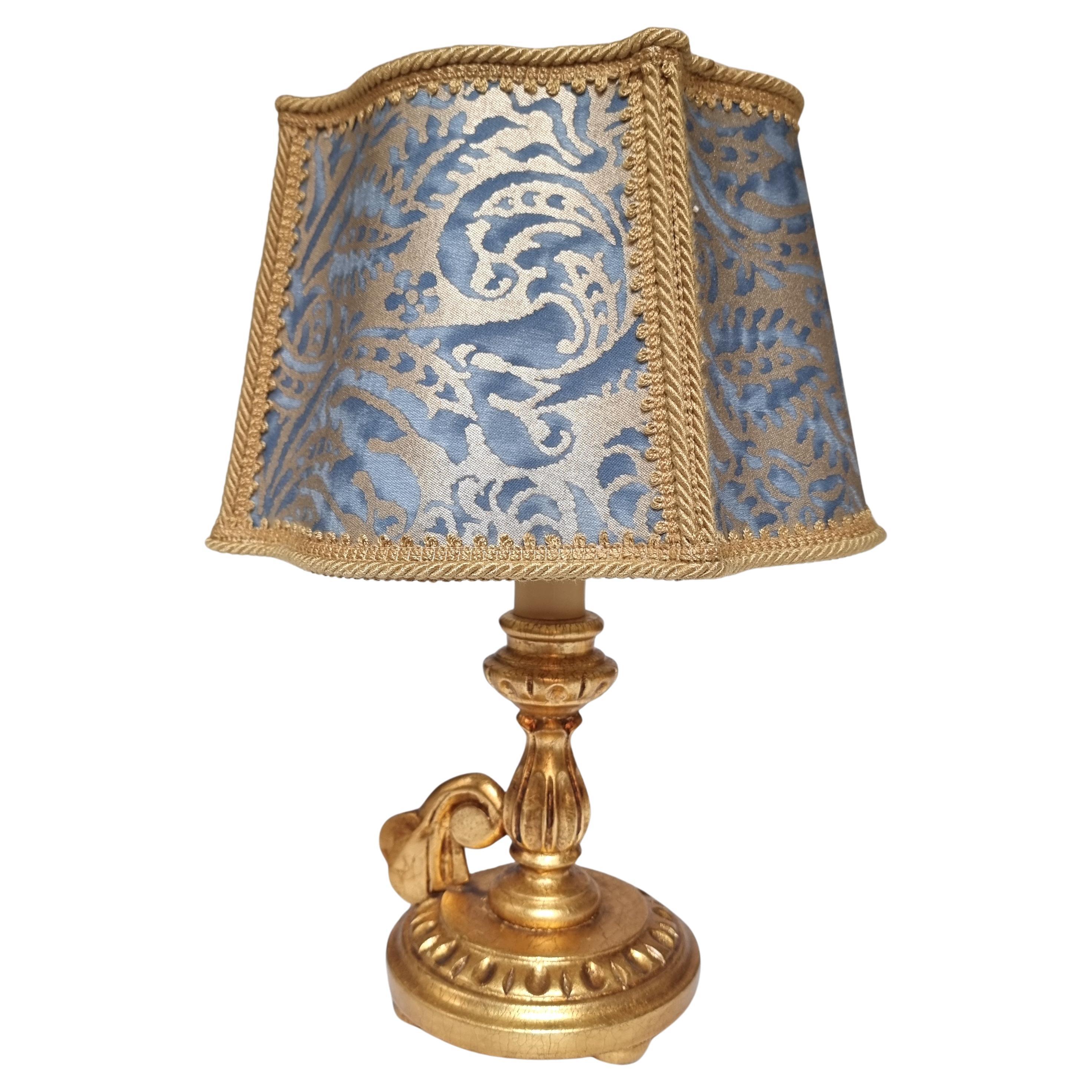 Hand-Carved Pair of Italian Gold Leaf Wooden Candlestick Table Lamps with Fortuny Lampshades For Sale