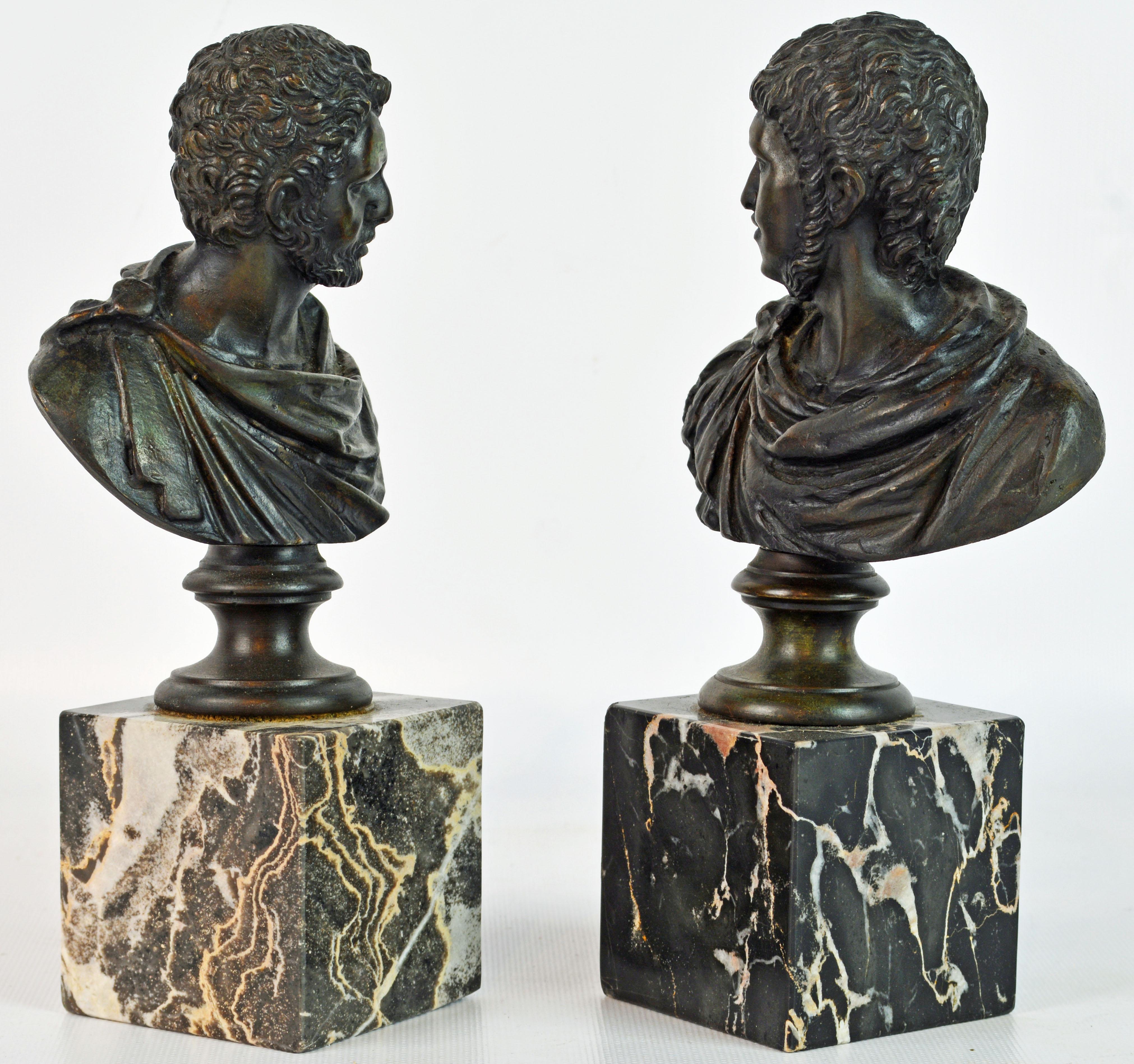A fine pair of small Italian Grand Tour patinated bronze busts mounted on square marble bases. The two emperors are well detailed and rest on circular shaped socles.

Caligula was Roman emperor from AD 37 to AD 41. The son of the popular Roman