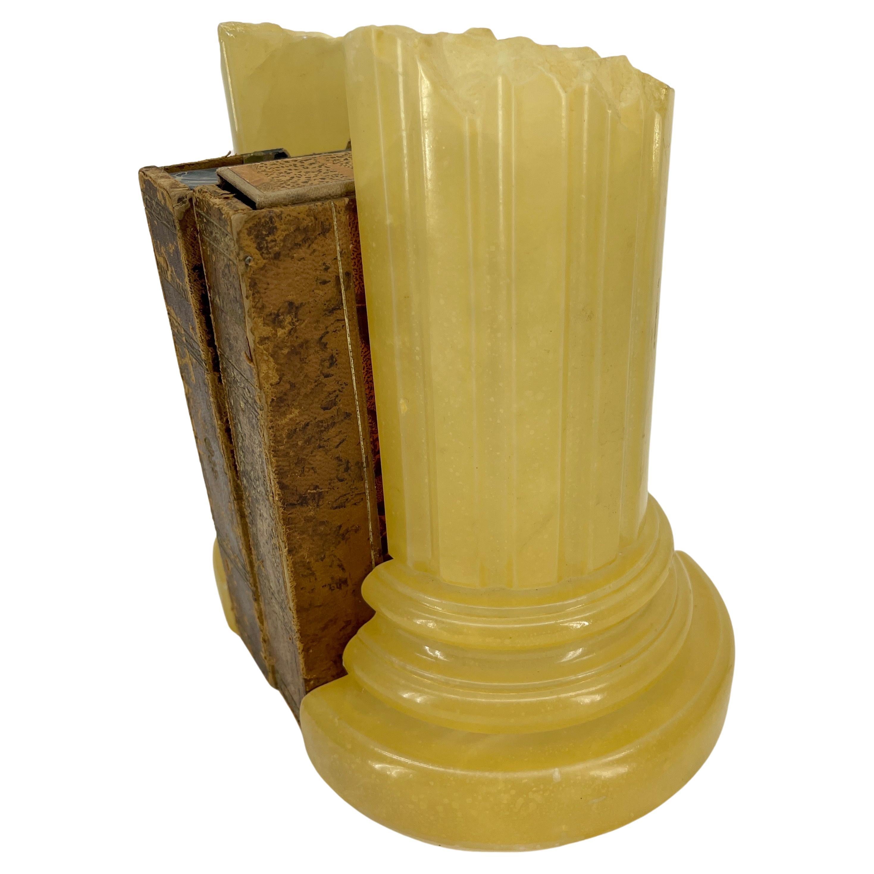 Grand Tour Column Bookends in Yellow Carved Alabaster from Italy, circa 1960s 
Bookends are marked with authentic period stickers 