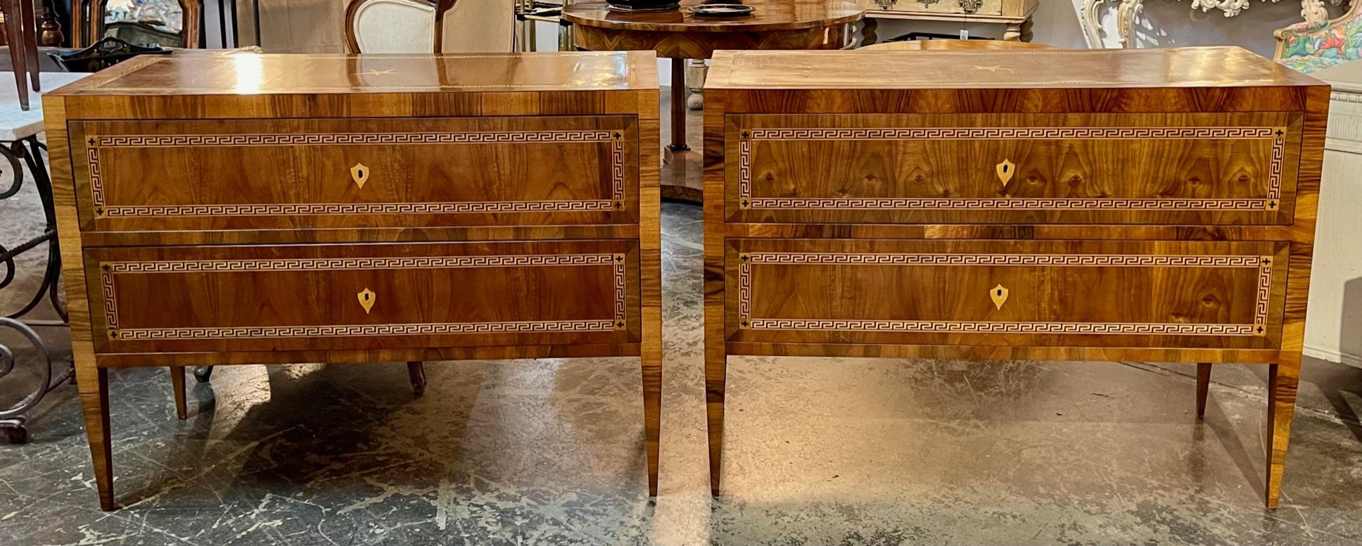 Pair of Italian high style inlaid walnut Greek Key commodes. Circa 2000. These are A favorite of top designers.