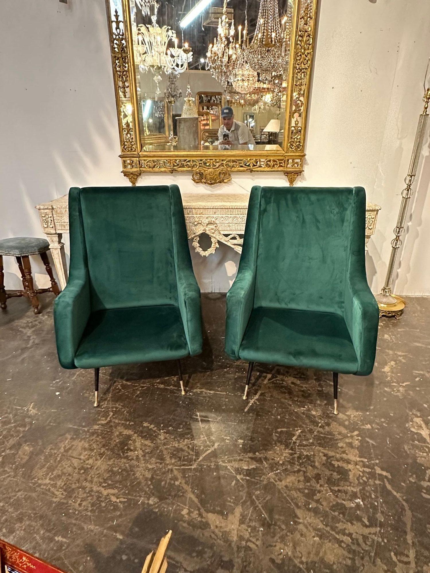 Handsome pair of Italian green velvet Mid-Century Modern high back chairs after Marco Zanuso. Makes a stylish statement!
