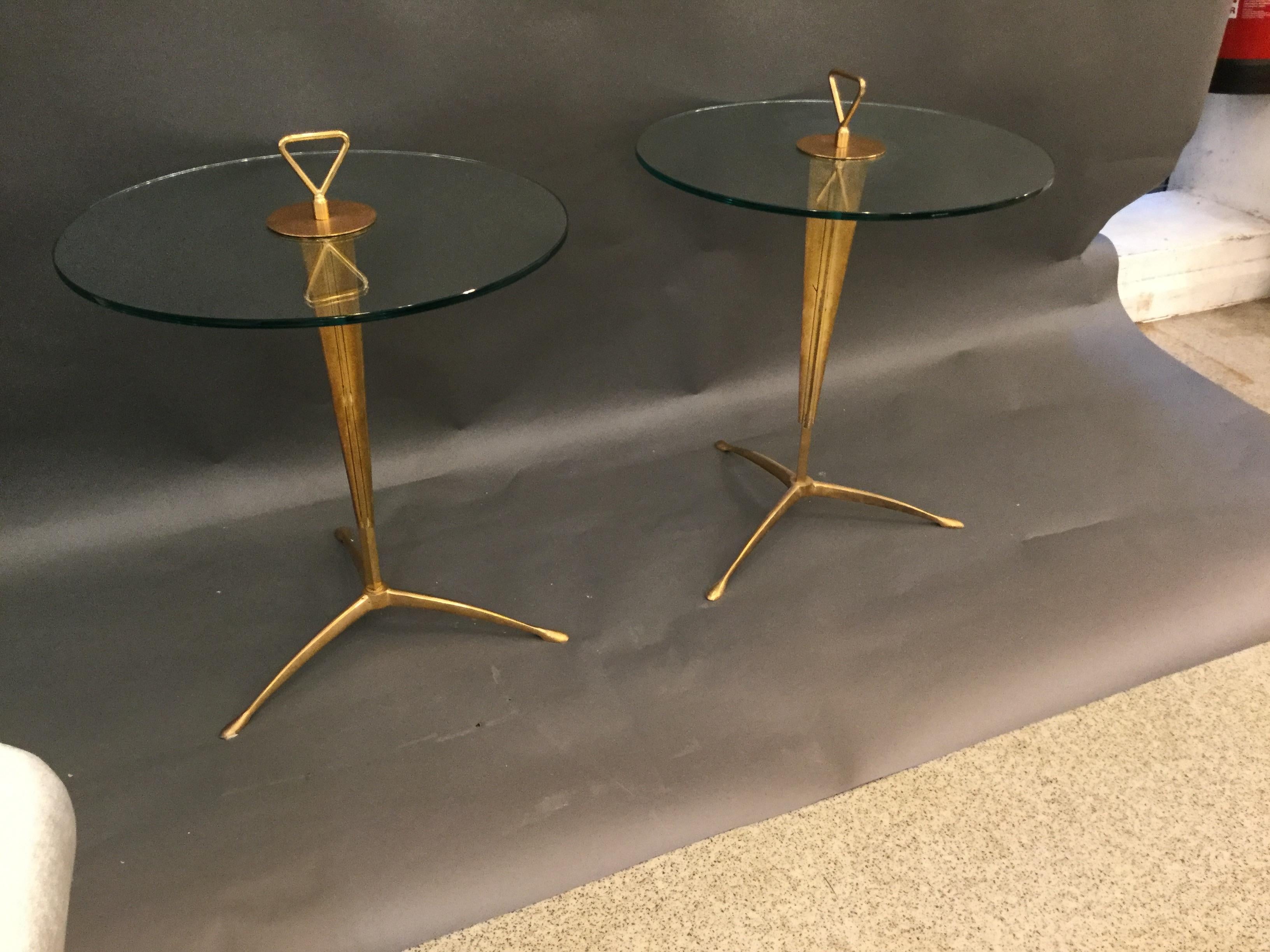 Pair of Italian midcentury gueridons/ round side tables in brass with glass top.