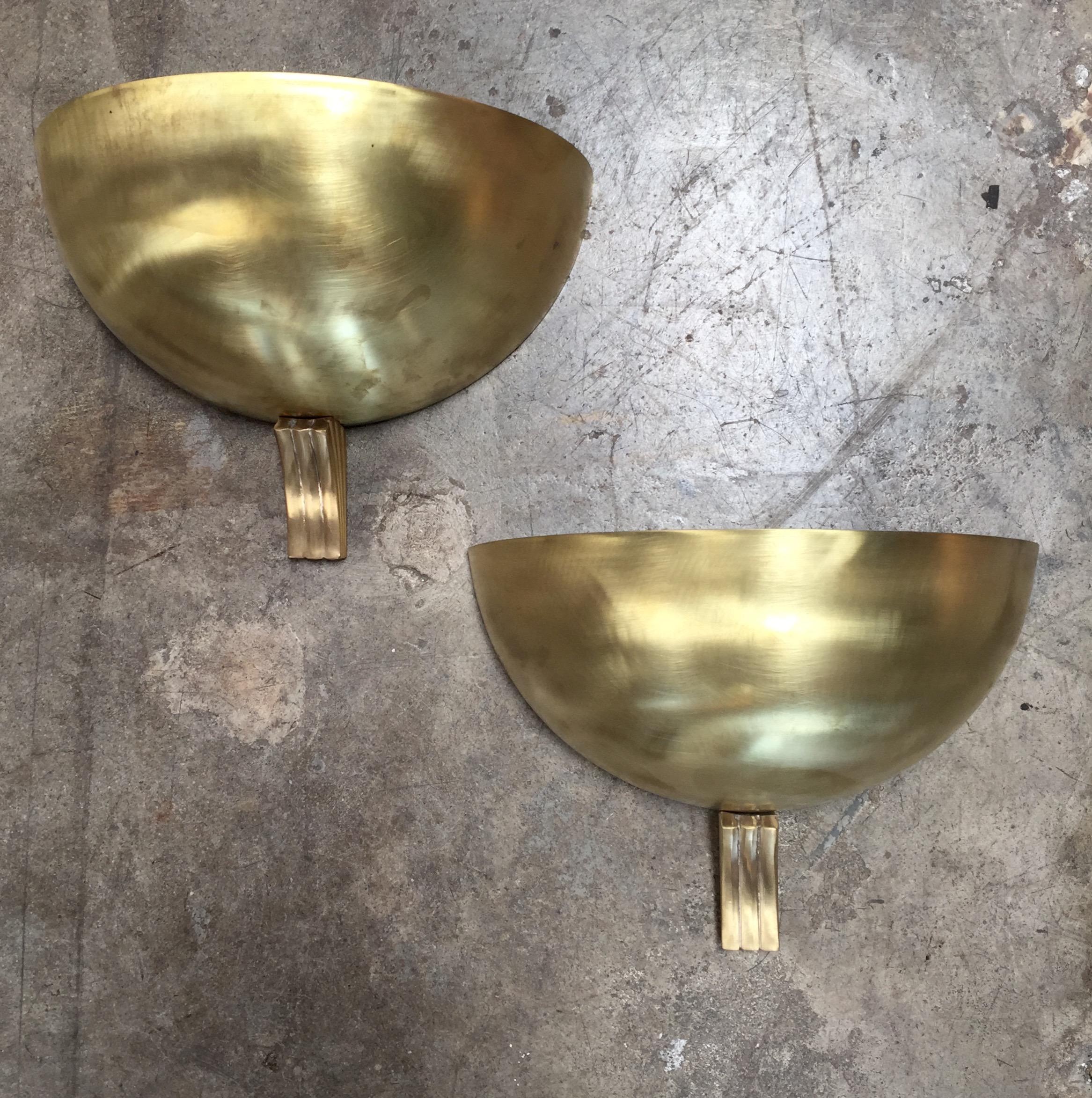 The brass bowl over three separate brass rods connected.
 
