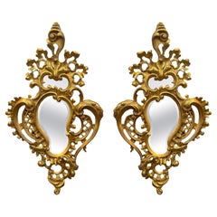 Pareja de espejos italianos de madera dorada tallados a mano, c. 1900