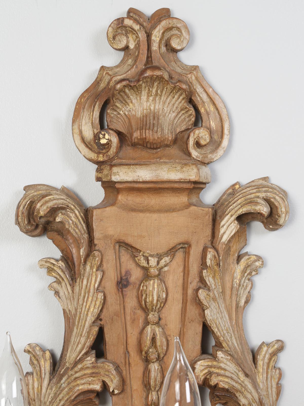 Mid-20th Century Pair of Italian Hand Carved Wooden Sconces with Gold and Silver Leaf Accents