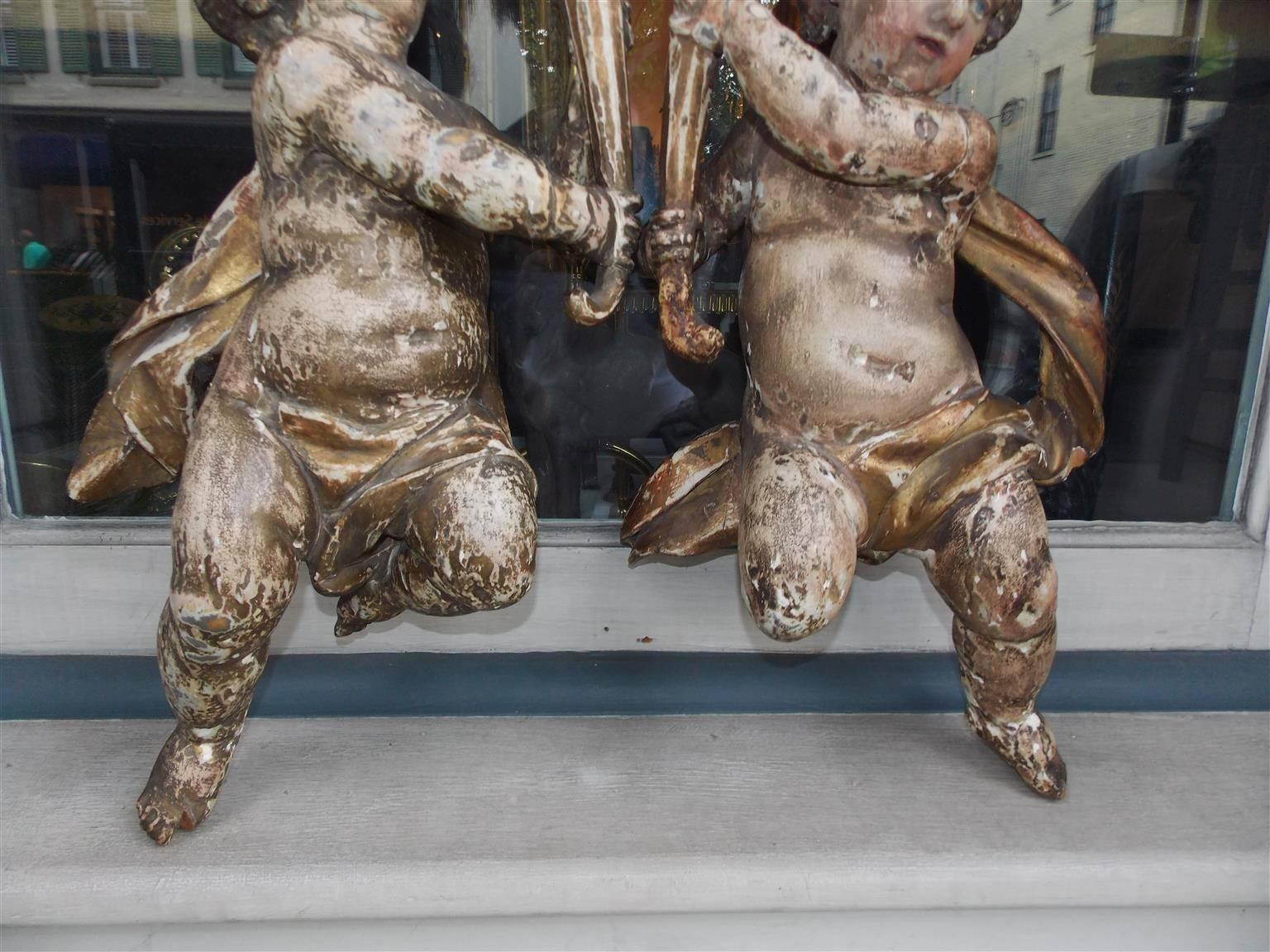 Gesso Pair of Italian Hanging Carved Wood and Polychromed Figural Putti, Circa 1790