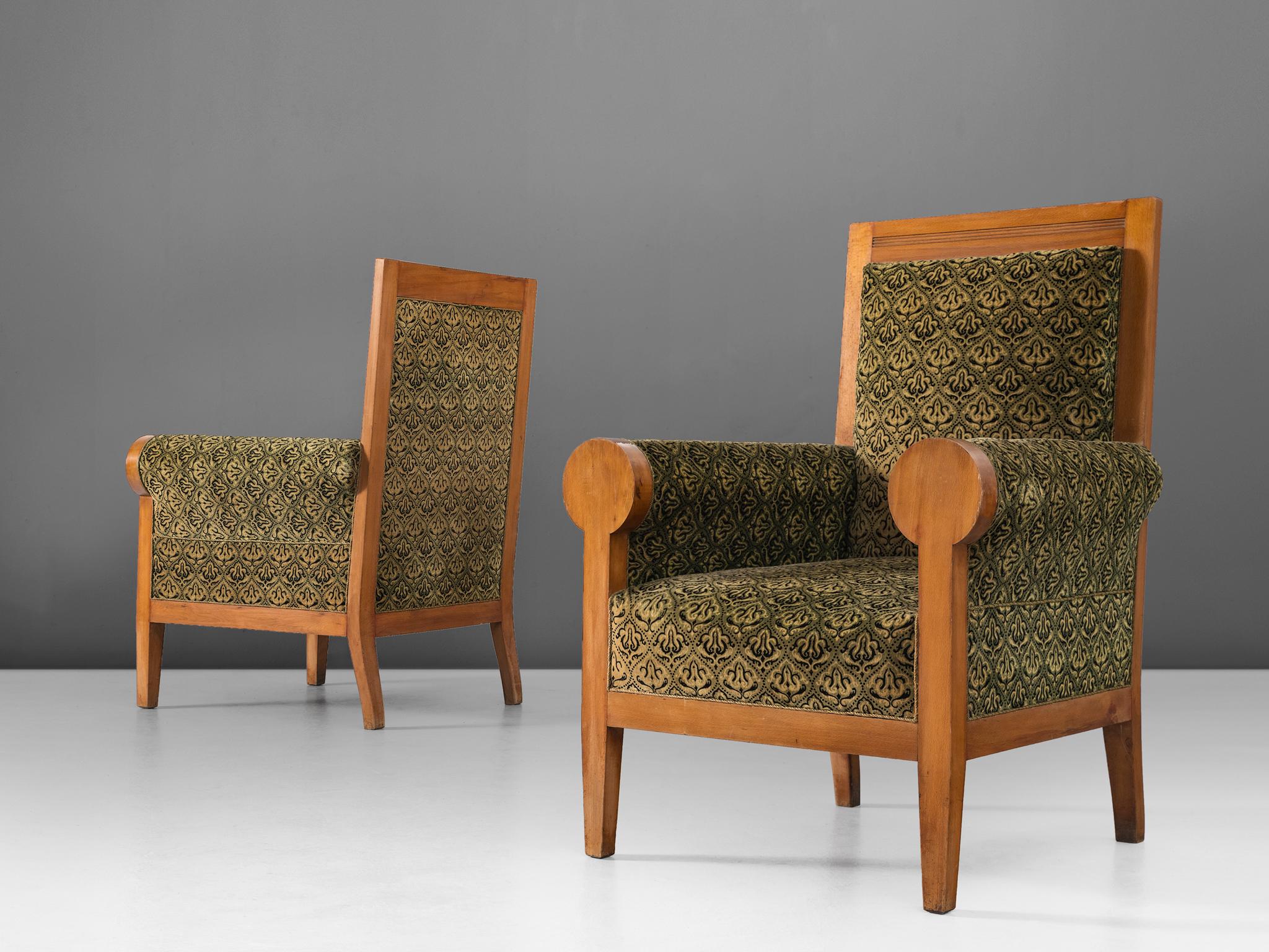 Set of two armchairs, in beech and fabric, Italy, 1950s.

Two stately armchairs in green fabric upholstery. These lounge chairs have a majestic appearance, due their high back and luxurious upholstery. The rounded armrests emphasize this royal