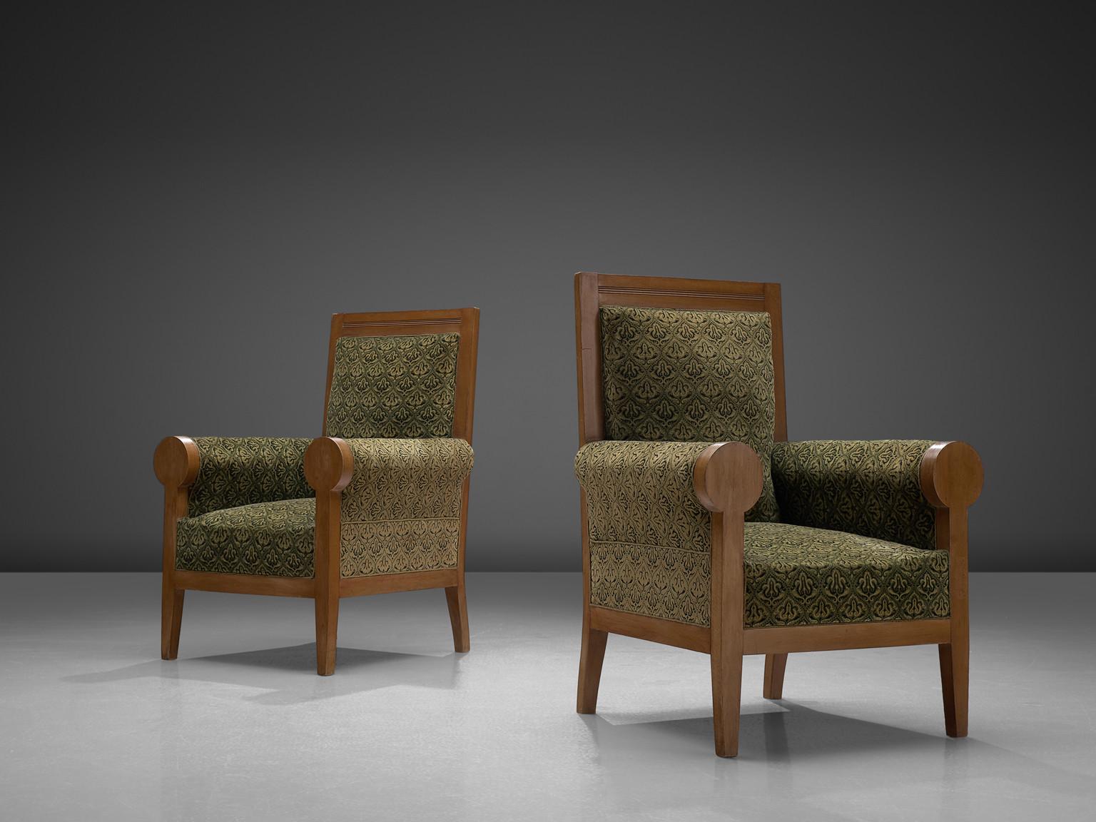 Set of two armchairs, in beech and fabric, Italy, 1950s.

Two stately armchairs in green fabric upholstery. These lounge chairs have a majestic appearance, due their high back and luxurious upholstery. The rounded armrests emphasize this royal