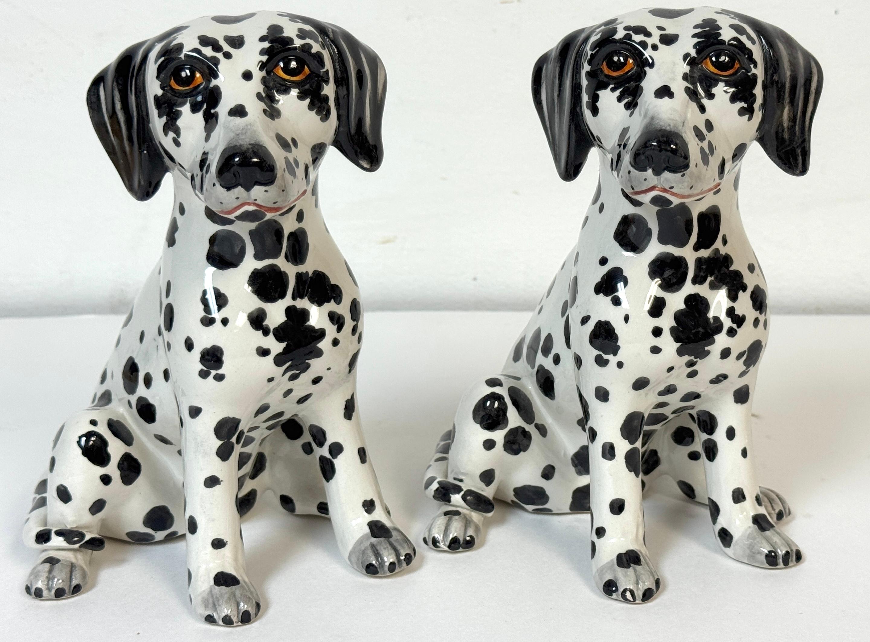 Pair of Italian Hollywood Regency Hand-Painted Pottery Dalmatian Puppies, Signed Italy, mid-20th century

A charming pair of hand-painted Italian pottery Dalmatian puppies, each modeled seated with soulful amber eyes and expressive spotted coats.