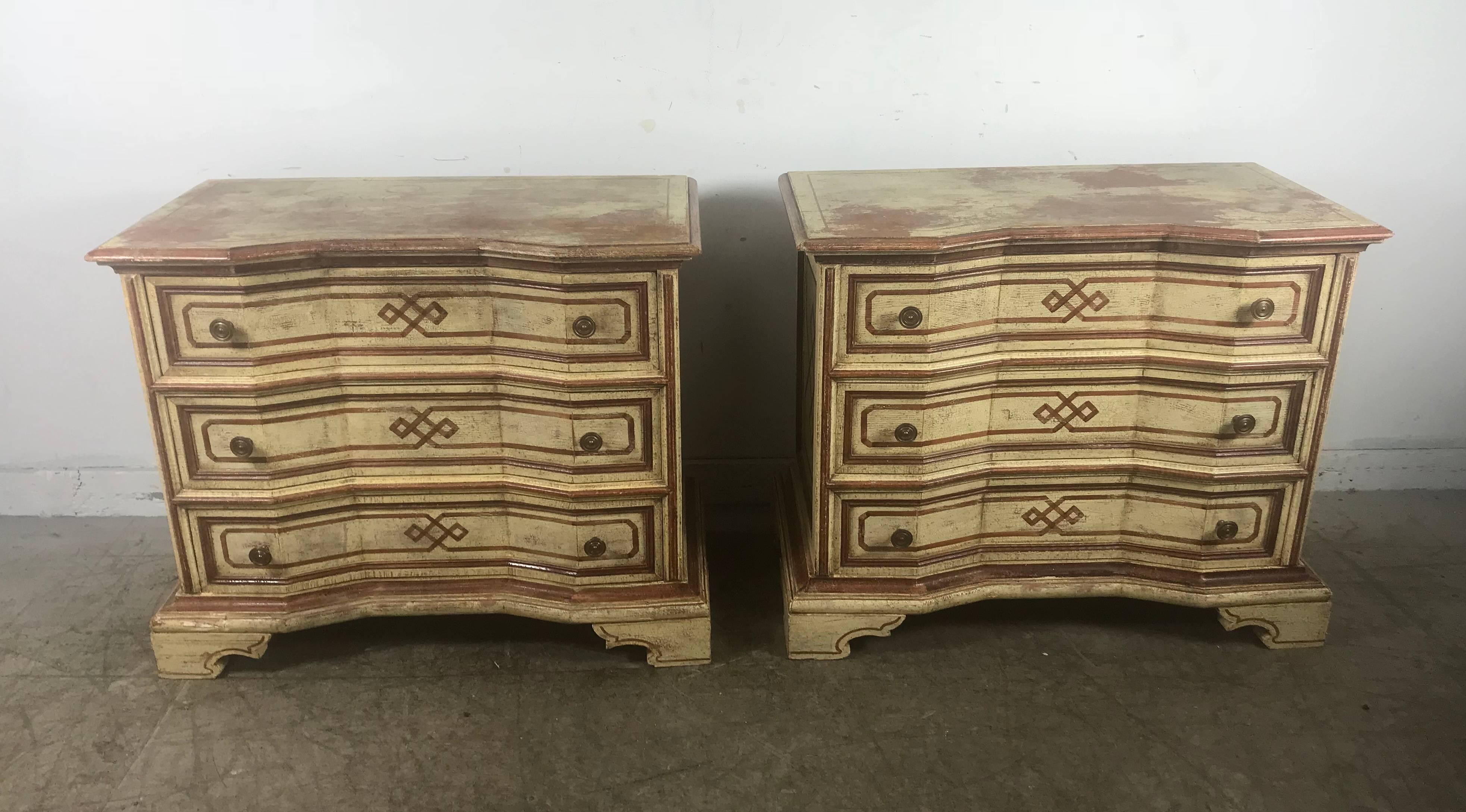 Pair of Italian Hollywood Regency painted three drawer stands or commodes, white washed , cerused and stenciled, striking design. Hand delivery avail to New York City or anywhere en route from Buffalo NY.