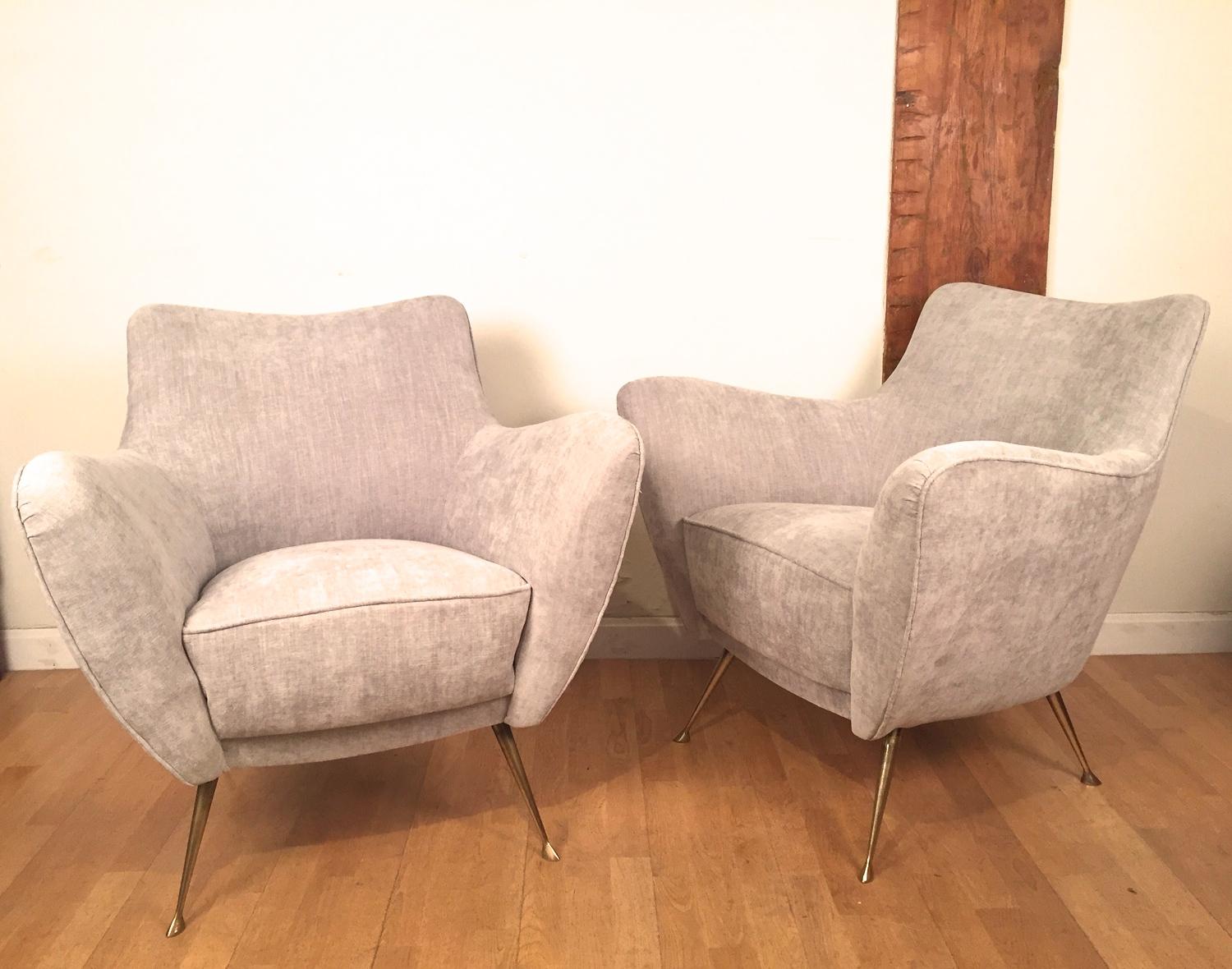 A pair of Italian 1950s vintage armchairs, in the style of Ico Parisi. Reupholstered in gray velvet. Brass legs. Excellent condition.