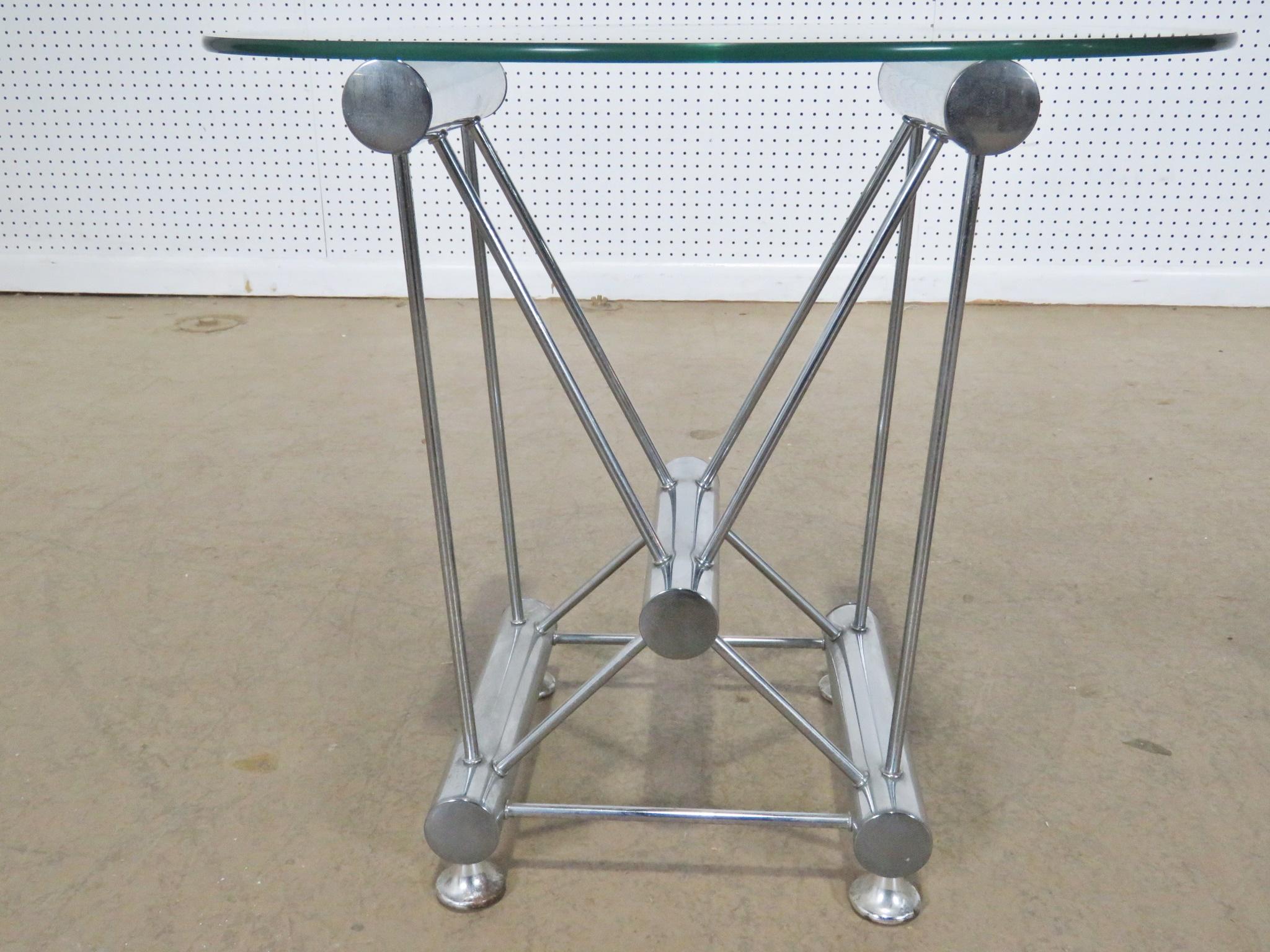 Pair of Italian chrome based Industrial style glass top side tables.