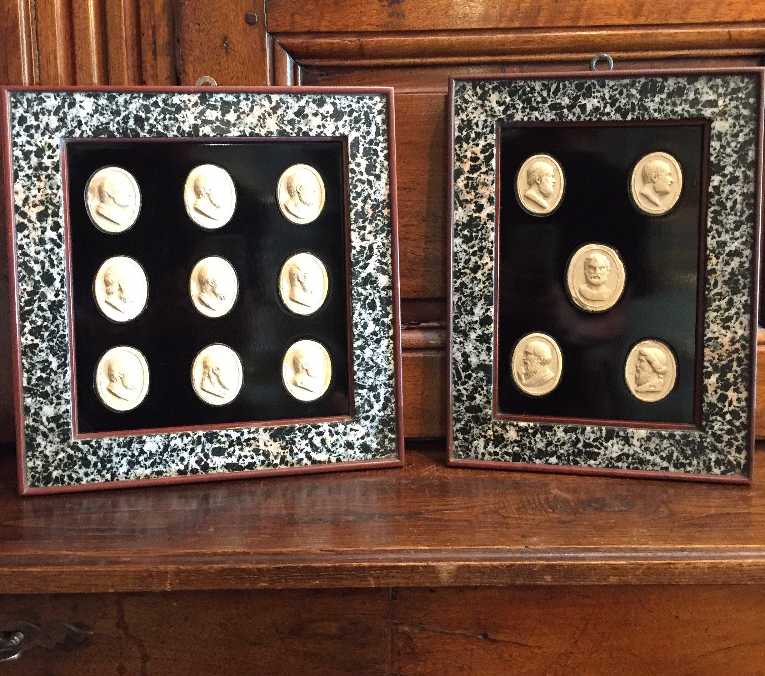 A pair of framed Grand Tour plaster intaglios dating from the early 19th century. This set of two Grand Tour neoclassical cameos compositions, consists of nine and five oval plaster cast medallions, depicting Greek philosopher profiles, mounted on