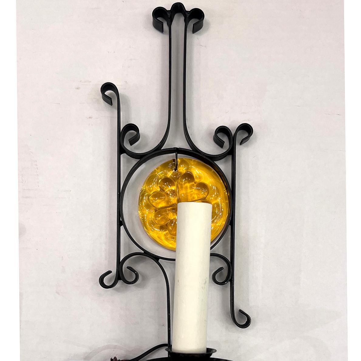 Pair of Italian circa 1960's wrought iron and glass sconces.

Measurements:
Height: 14