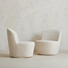 Pair of Italian Ivory Boucle Swivel Lounge Chairs, 1960s