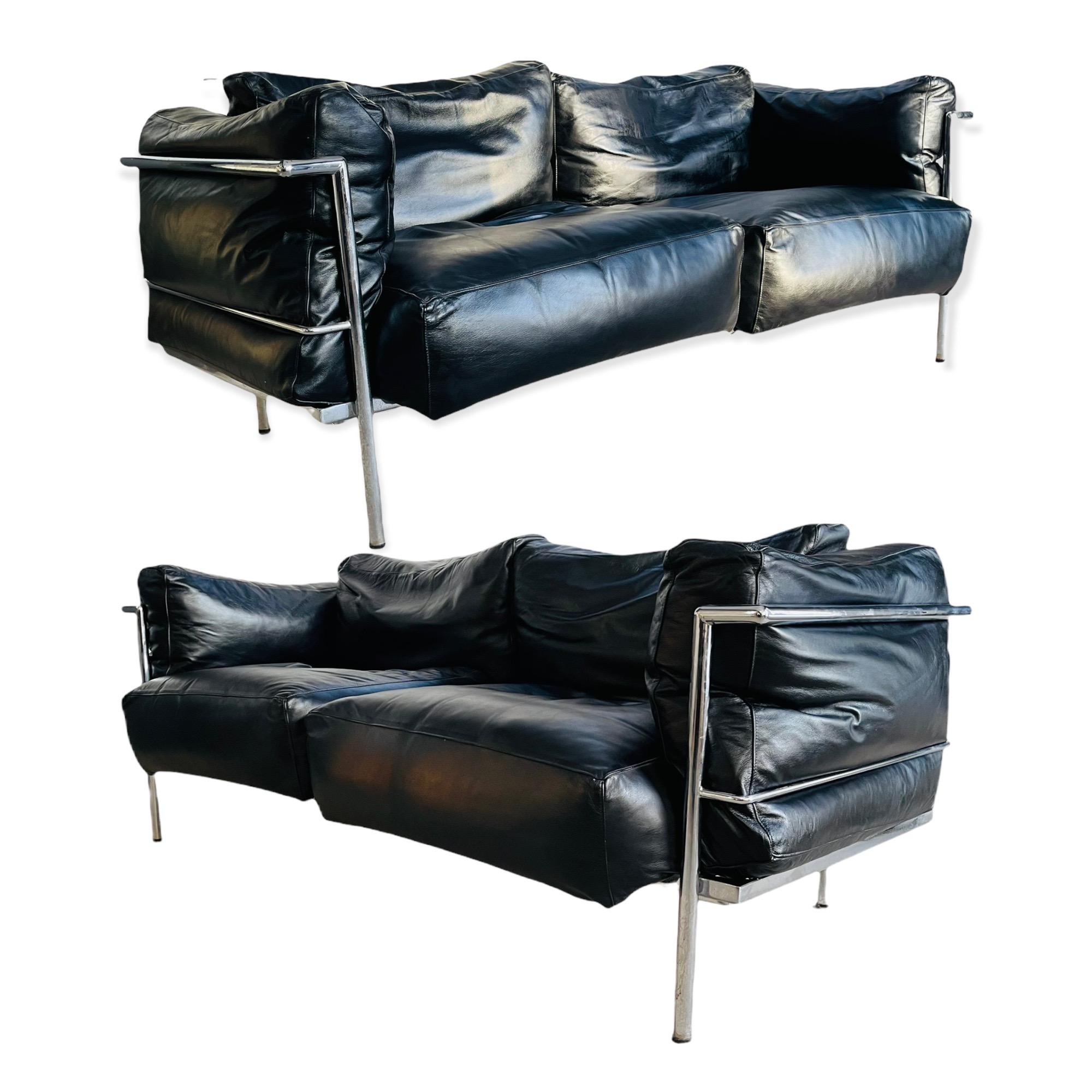 Stunning pair of Le Corbusier model LC2 sofas. The sofas are Italian leather on a tubular chrome frame. Both sofas have been nicely worn in and have an excellent vintage patina. The sofa is marked under “Made In Italy”.

Measures: W 68” x D 28” x