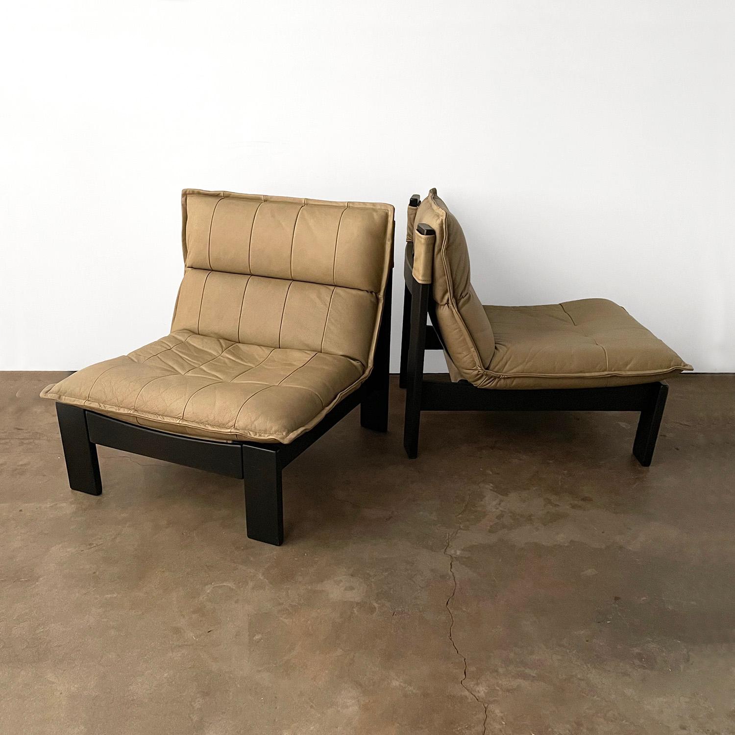Pair of Italian leather sling chairs
Italy, circa 1970’s
Earthy olive green leather
Leather newly restored
Small markings to leather and one small imprint
*See photos
Wooden frame
Patina from age and use.