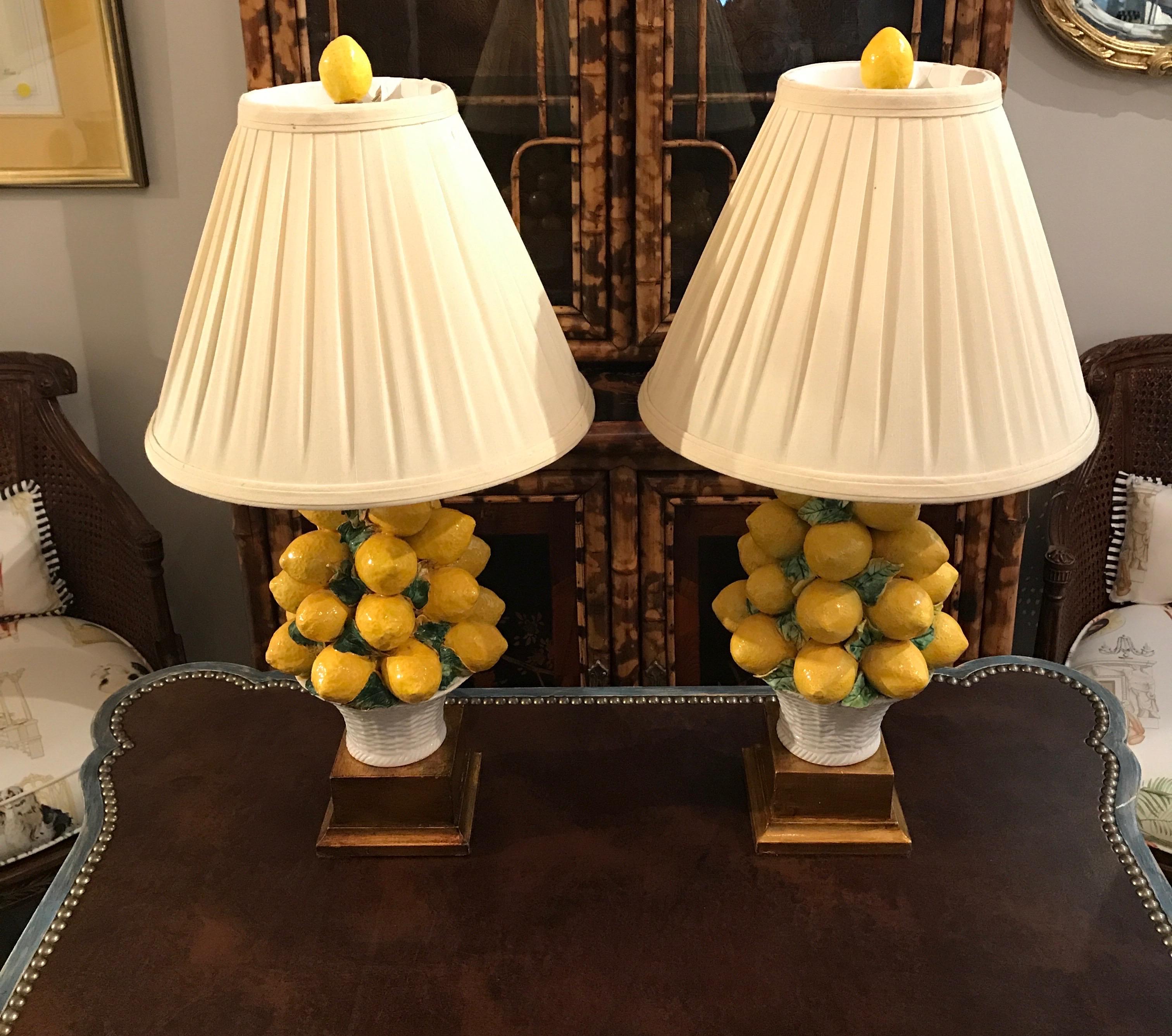 Pair of Italian lemon topiary lamps with shades and matching lemon finials.