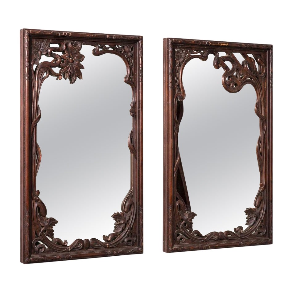 Pair of Italian Liberty, Art Nouveau Carved Walnut Mirrors